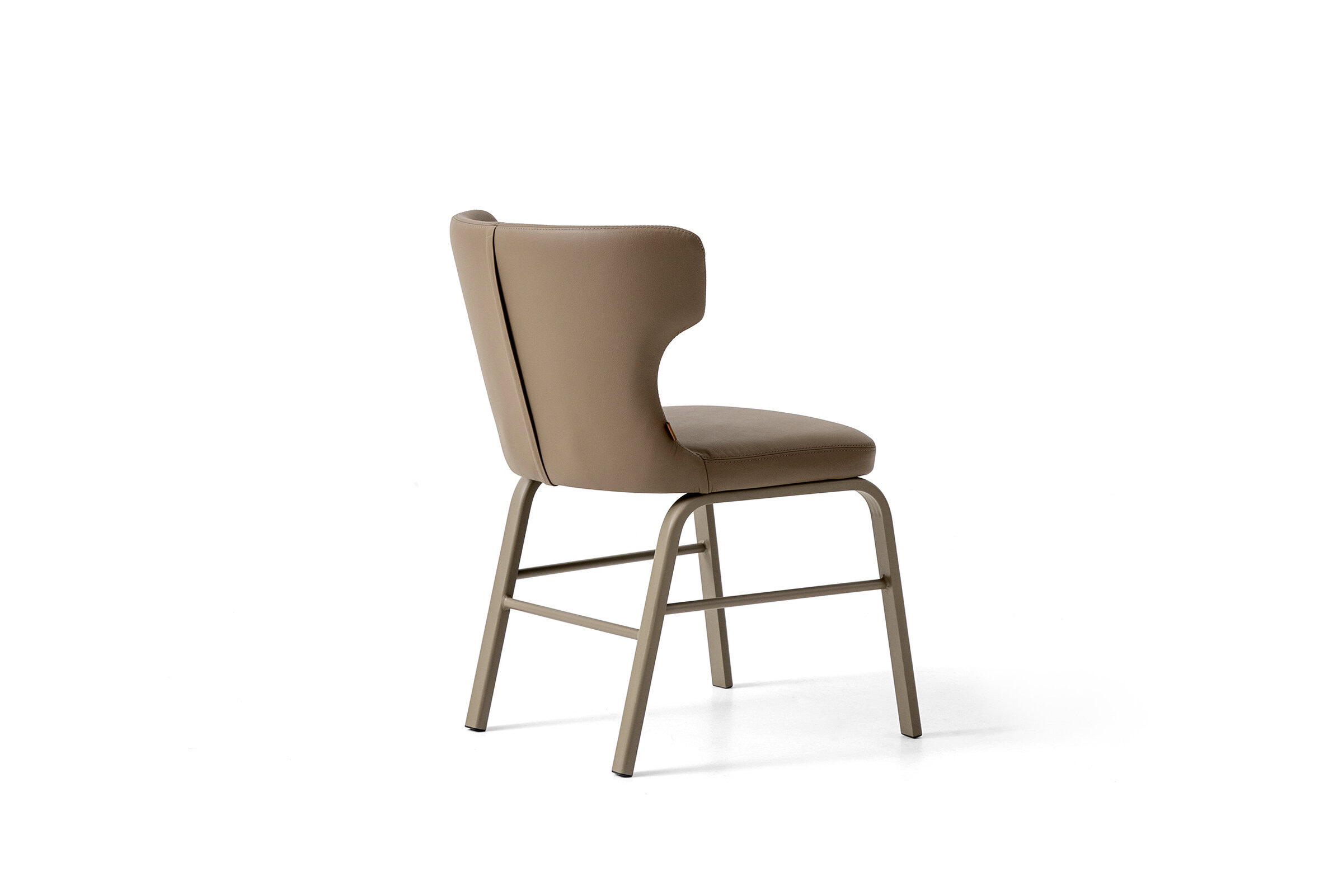 Warm beige upholstered dining chair with a modern curved backrest and sturdy wooden legs, ideal for contemporary dining rooms and cafes.
