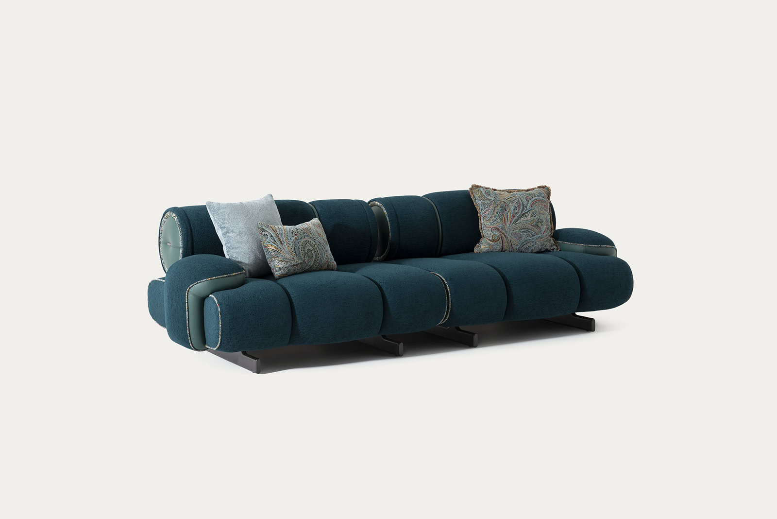 Stylish blue sofa with decorative cushions from Saloni Furniture, perfect for modern living rooms.