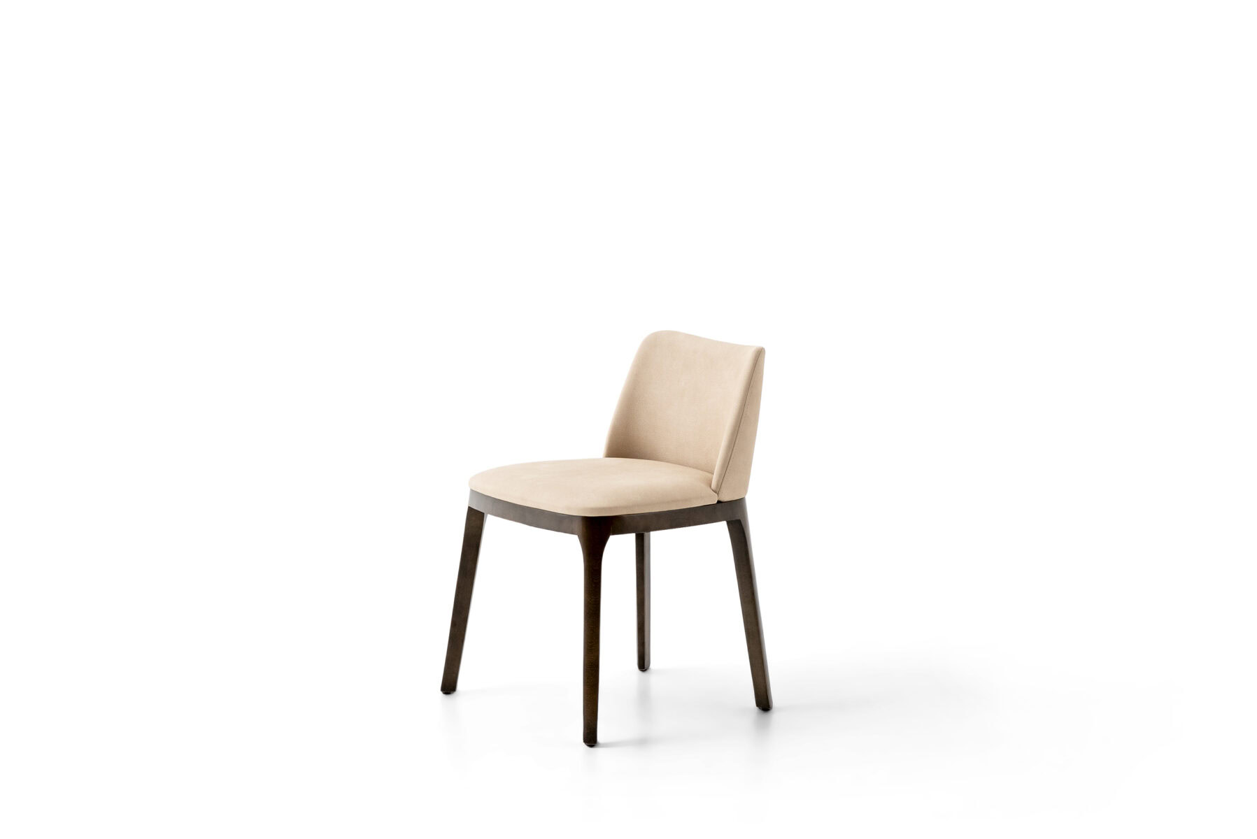 Modern beige dining chair with wooden legs from Saloni Furniture, perfect for contemporary dining rooms and stylish interiors.