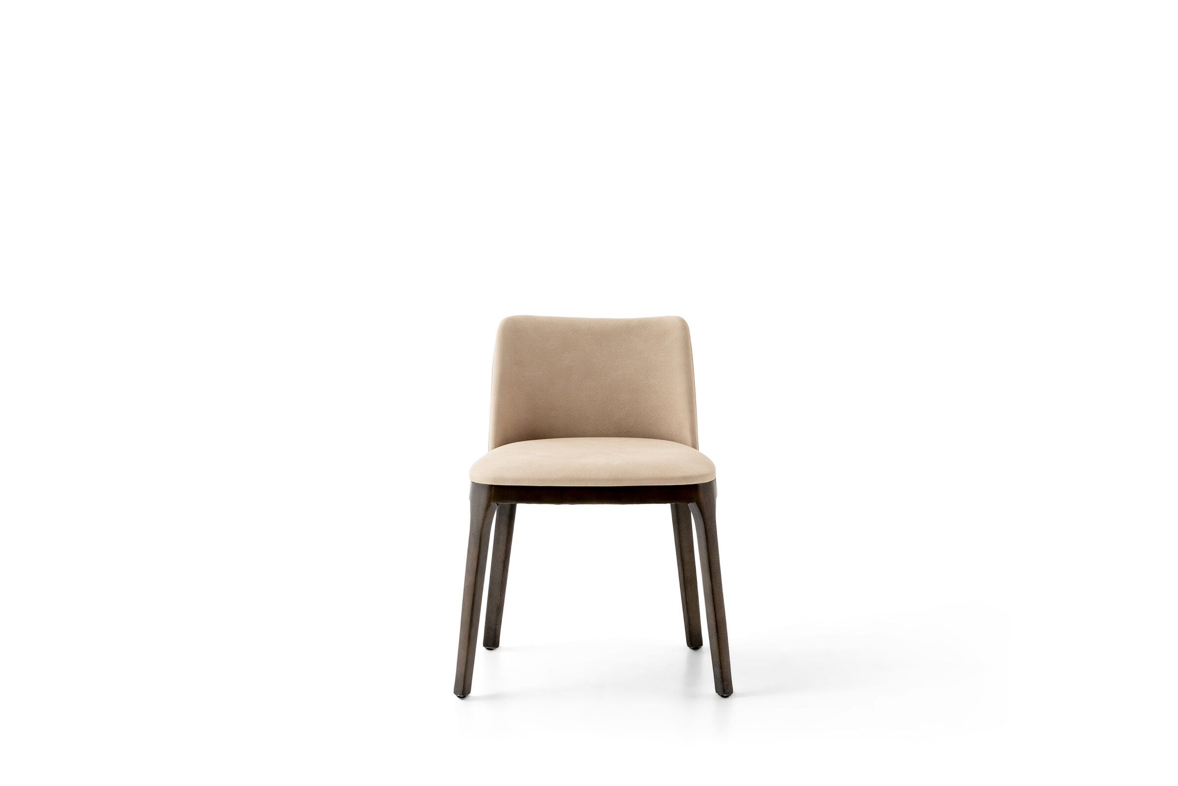 Elegant beige upholstered dining chair with wooden legs, ideal for contemporary home interiors, from Saloni Furniture.