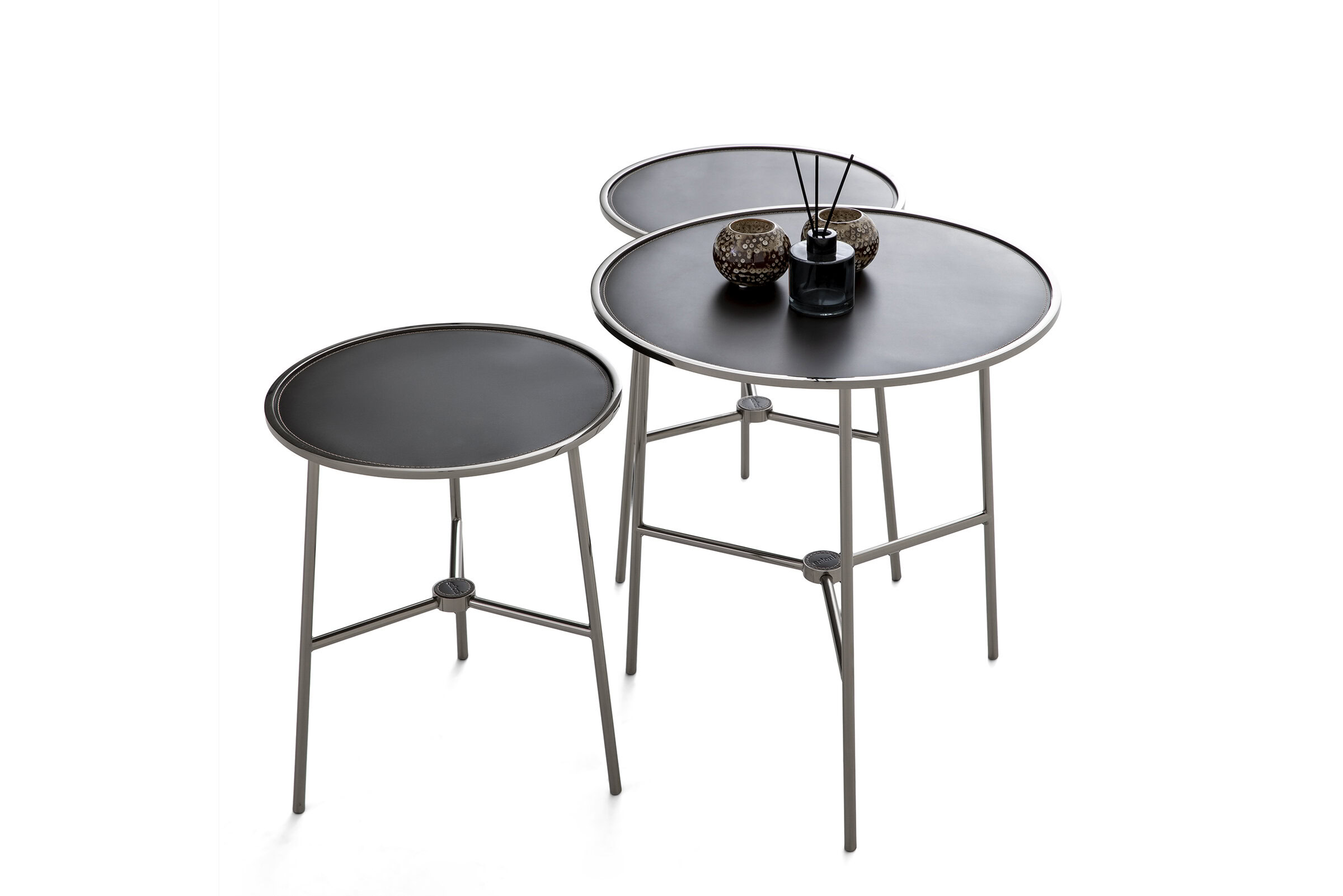 Set of two modern black metal side tables with round tabletops, stylish design, and minimalist aesthetic, perfect for contemporary living spaces.