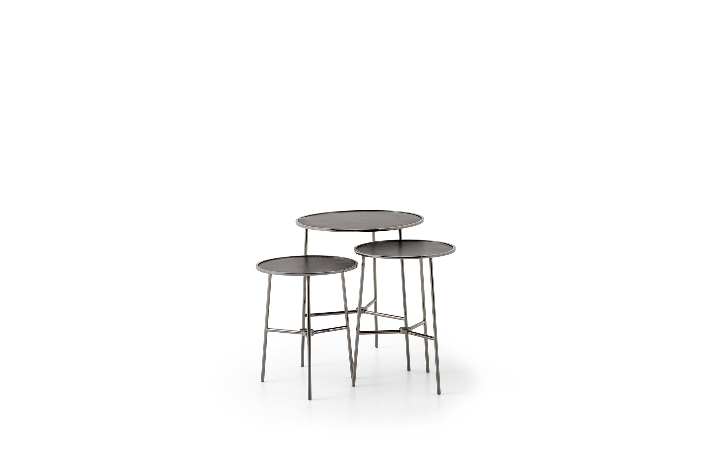 Set of three modern nesting tables with sleek metal frames and round tabletops, ideal for contemporary living spaces.