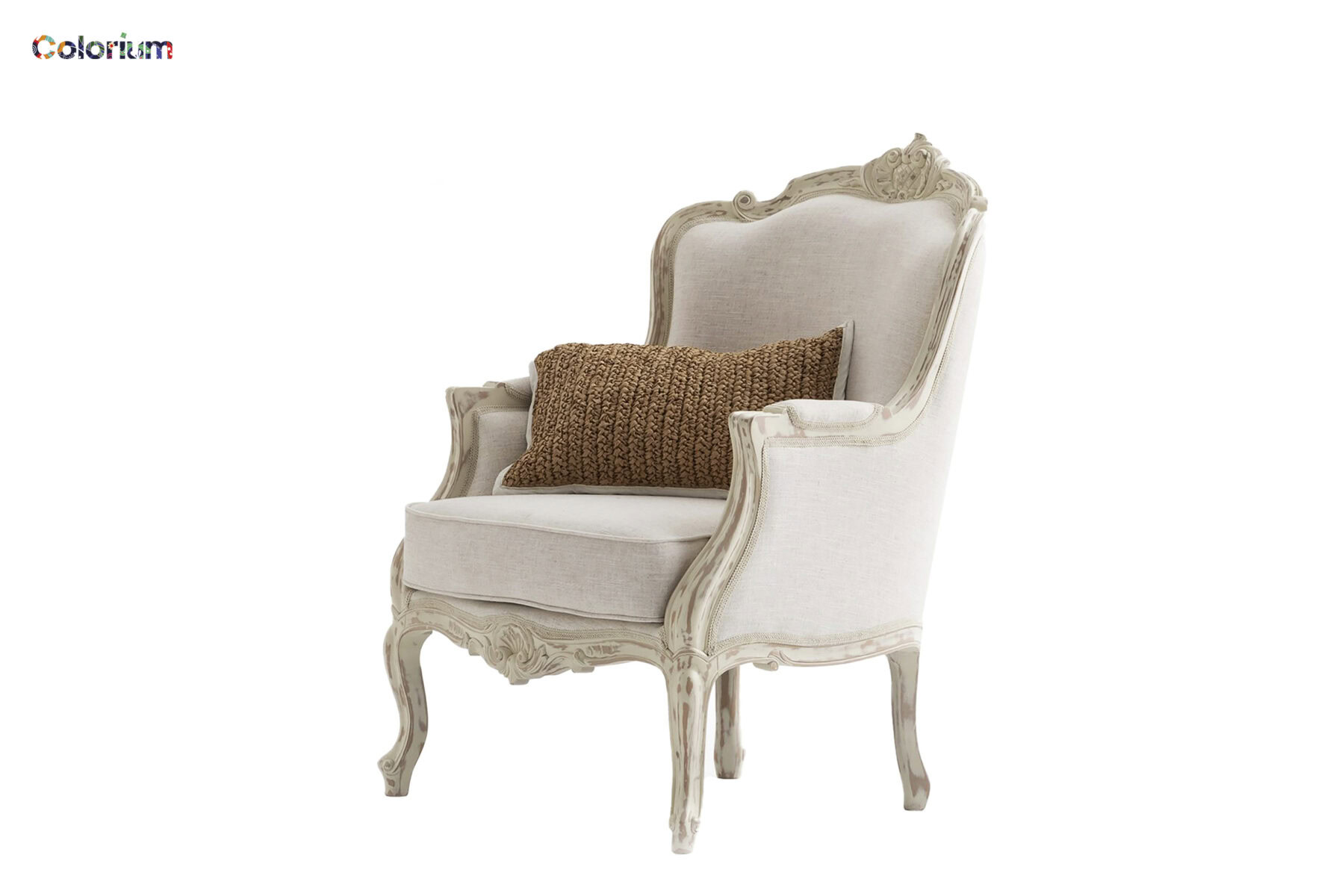 Elegant vintage armchair with ornate carved wood frame, upholstered in cream fabric, featuring a textured brown decorative pillow, perfect for classic or luxurious interior decor.