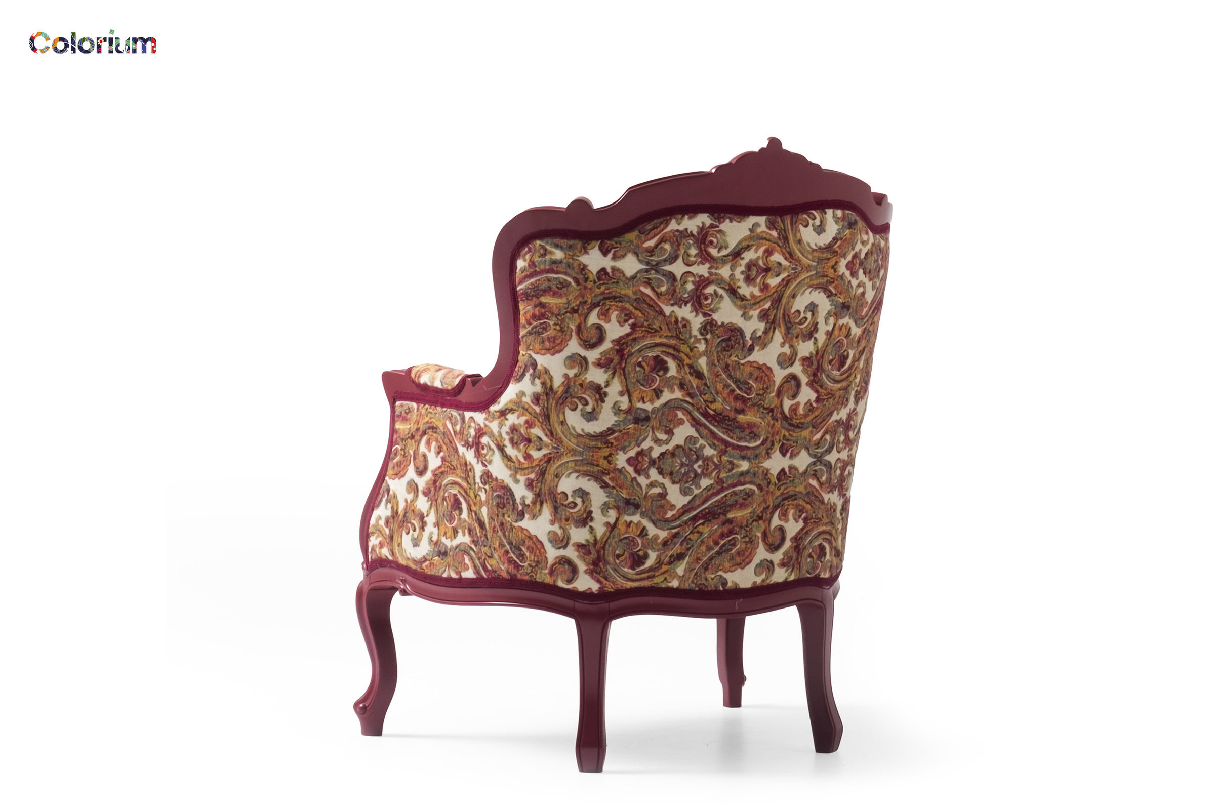 Luxurious vintage armchair with carved wooden frame and floral upholstery, perfect for elegant living rooms and classic furniture settings.