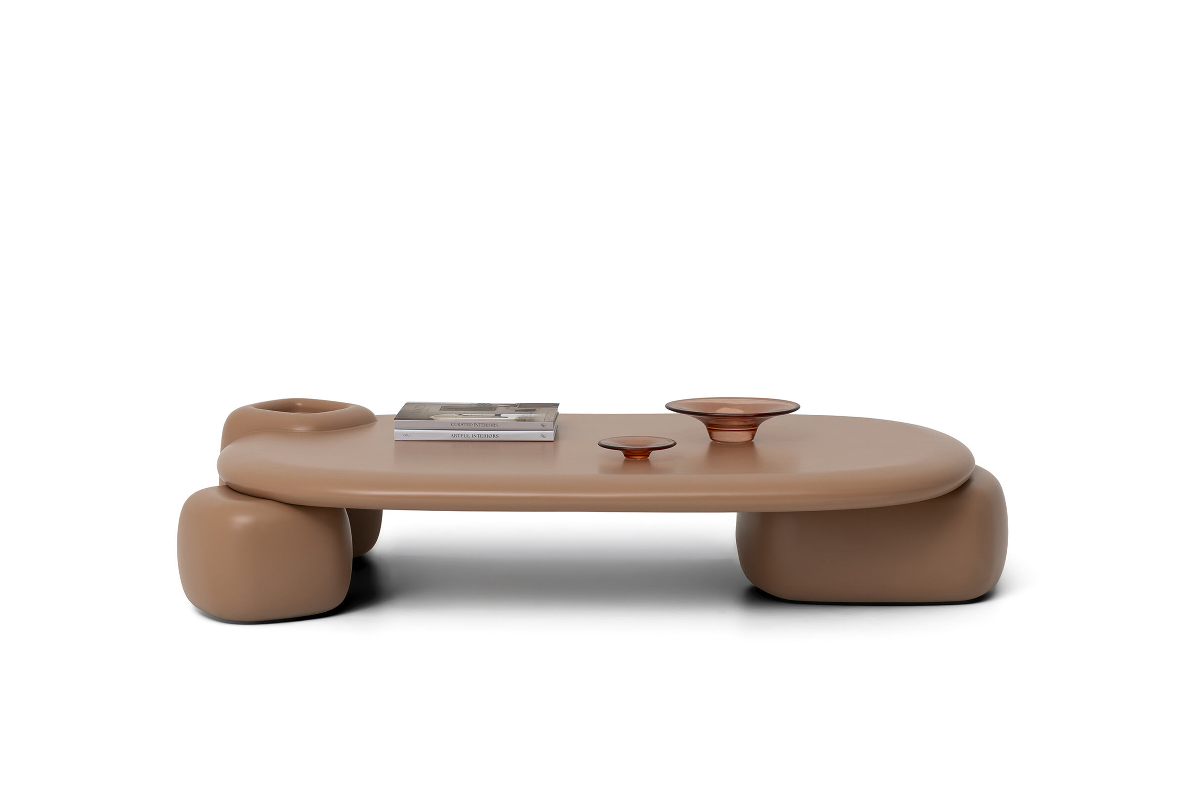 Contemporary Saloni Furniture coffee table with smooth curves and minimalist design in neutral beige color.