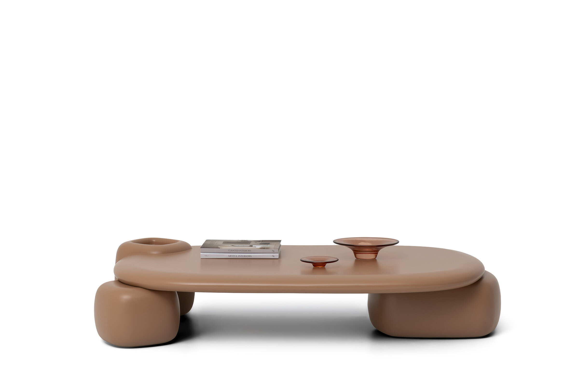 Contemporary beige coffee table with rounded edges and unique sculptural legs, perfect for modern living rooms.
