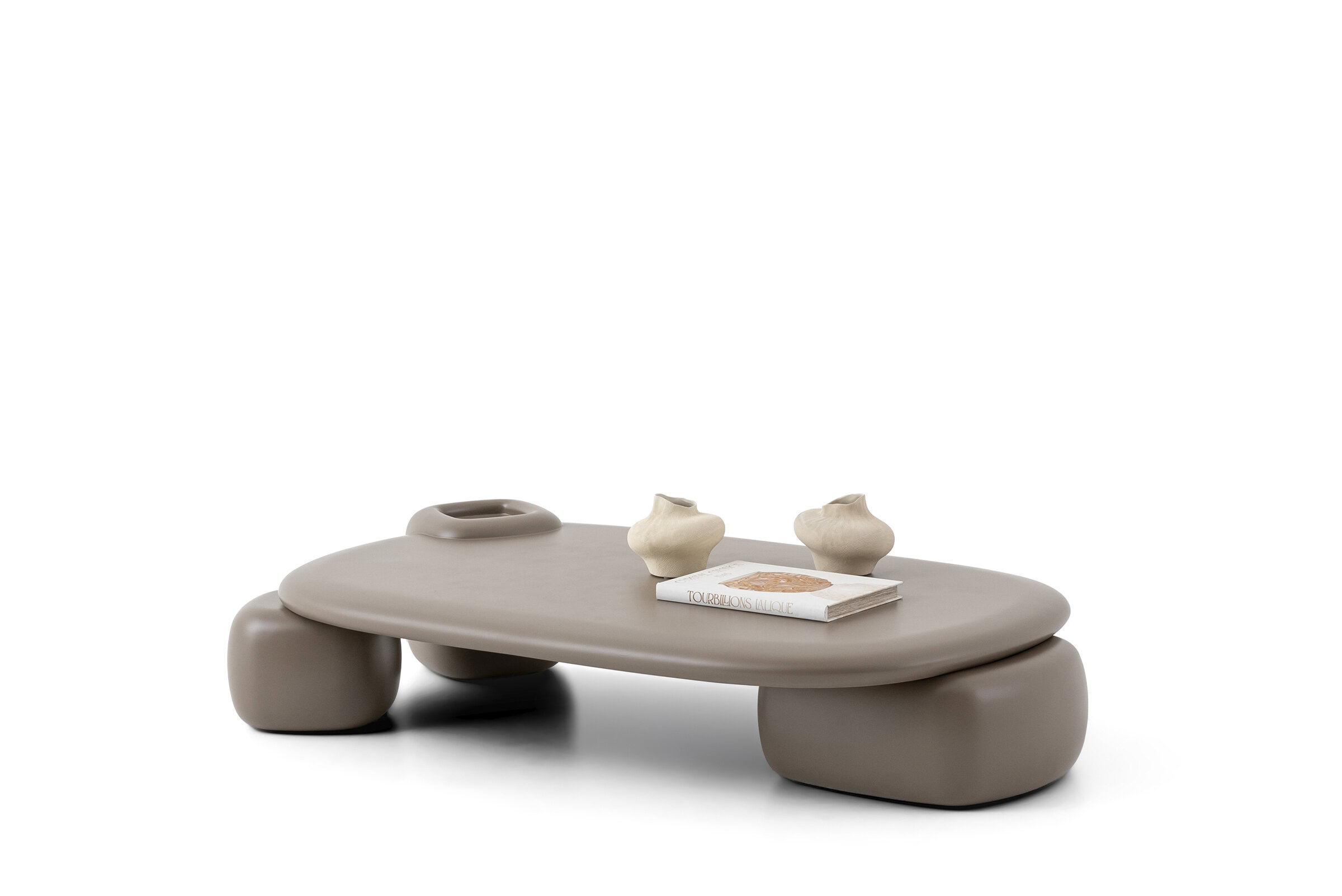Contemporary beige coffee table with rounded edges and unique sculptural legs, perfect for modern living rooms.
