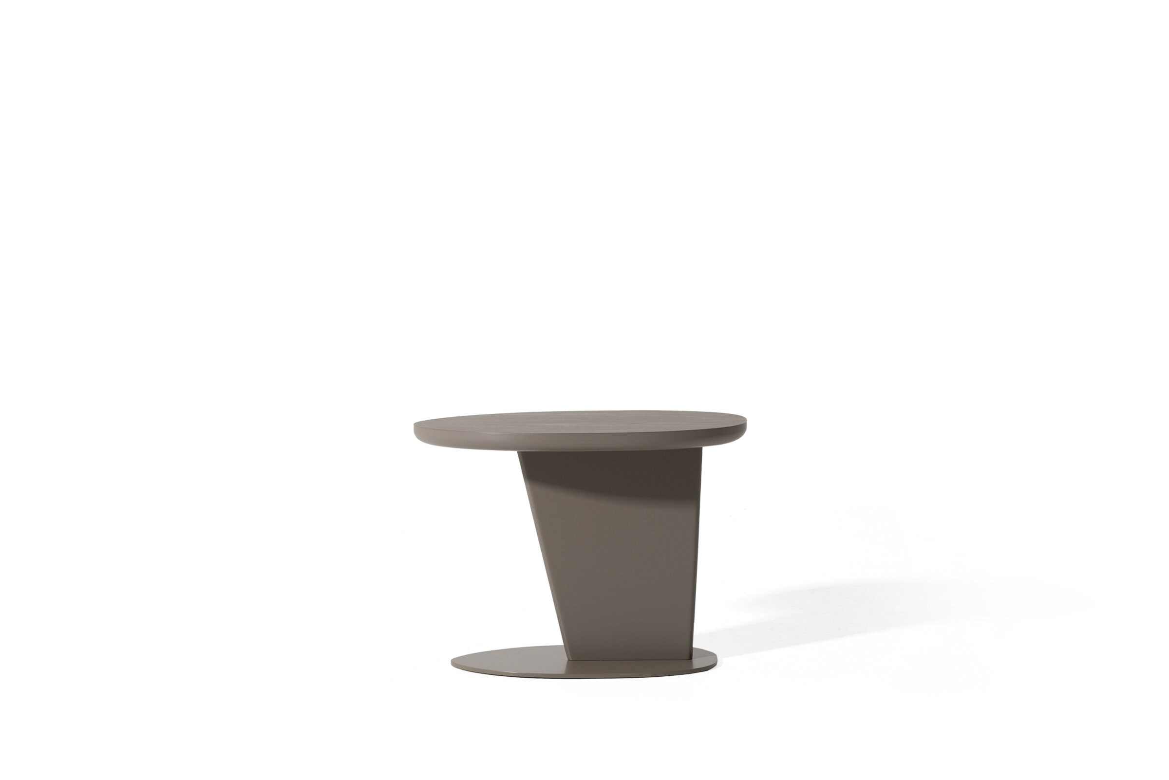 Metal round side table with unique angled base, modern furniture design, perfect for living rooms and bedrooms, available at Saloni Furniture.