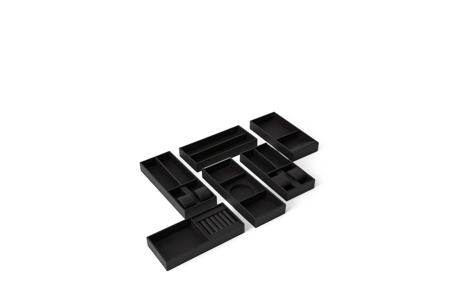 Black drawer organizers with multiple compartments for kitchen, office, or craft storage solutions.
