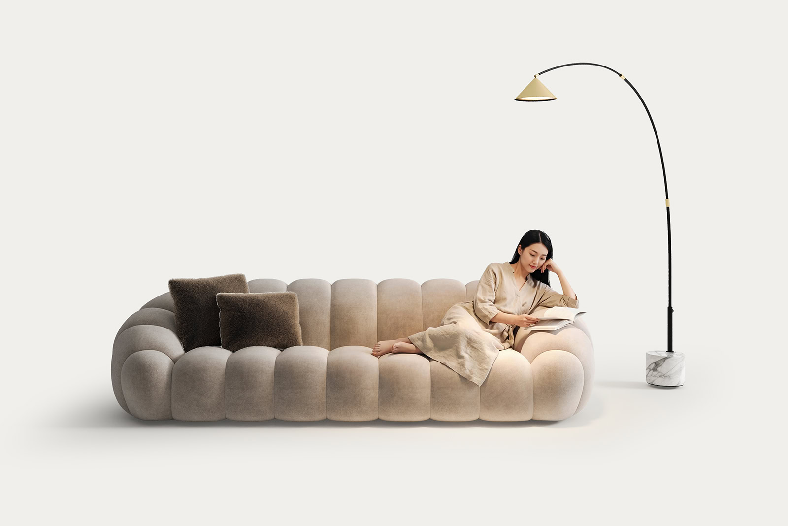 Elegant beige sofa with plush cushions and a stylish floor lamp, perfect for contemporary living rooms.