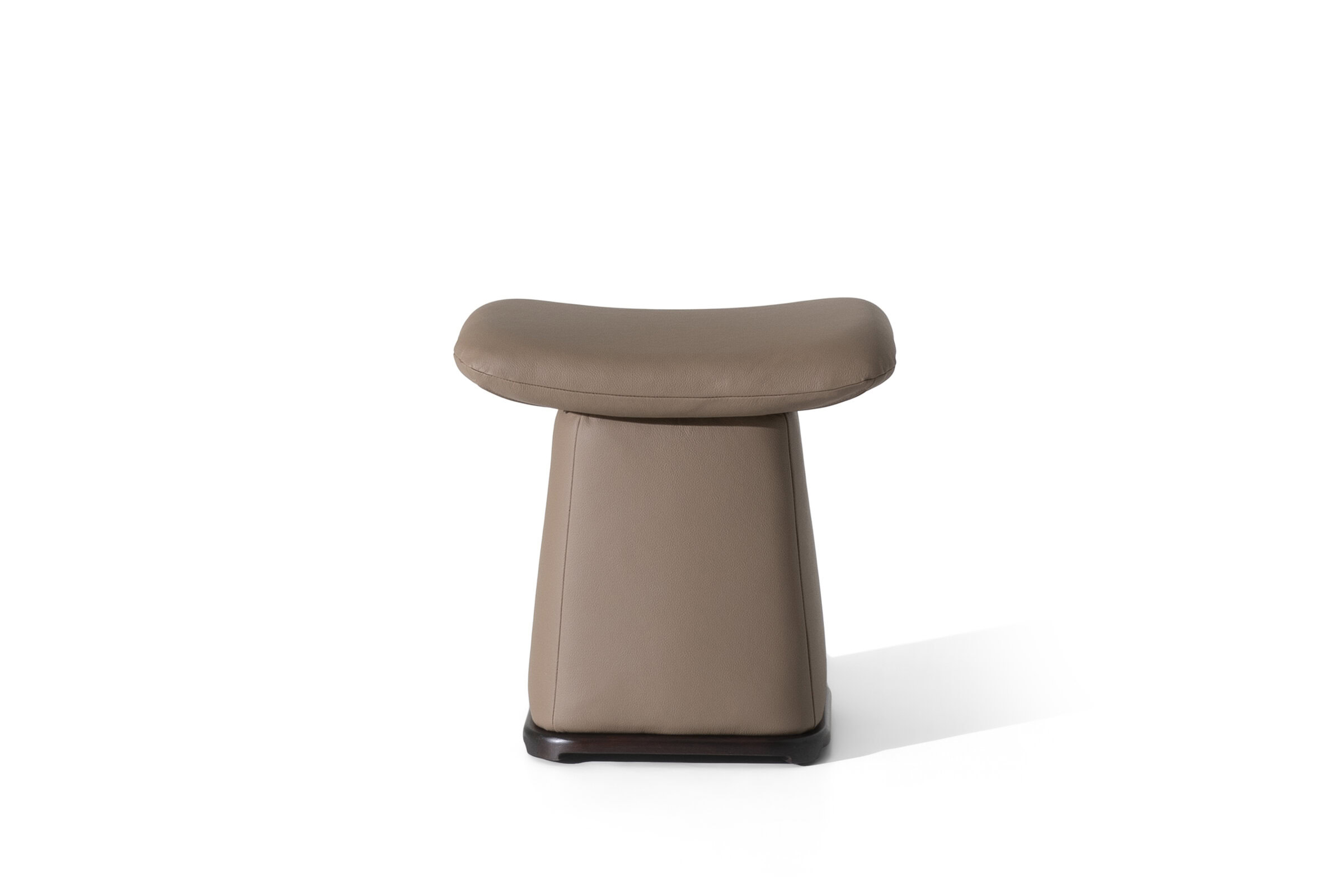 Elegant beige upholstered stool with a cushioned seat and sturdy base, ideal for contemporary home interiors.
