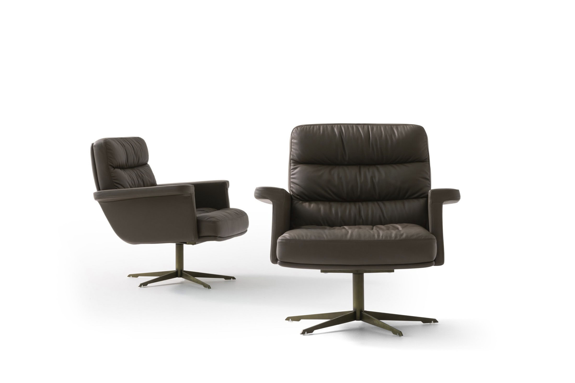 Upholstered leather swivel armchairs with modern design, ergonomic comfort, and adjustable bases for stylish office or home workspace furniture.