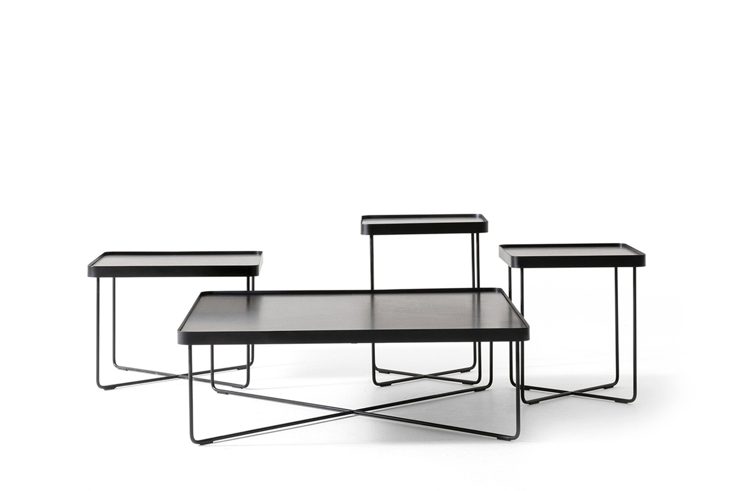 Sleek black modern coffee table with minimalist metal frame, perfect for contemporary living room decor. Elegant design combining style and functionality for stylish interiors.