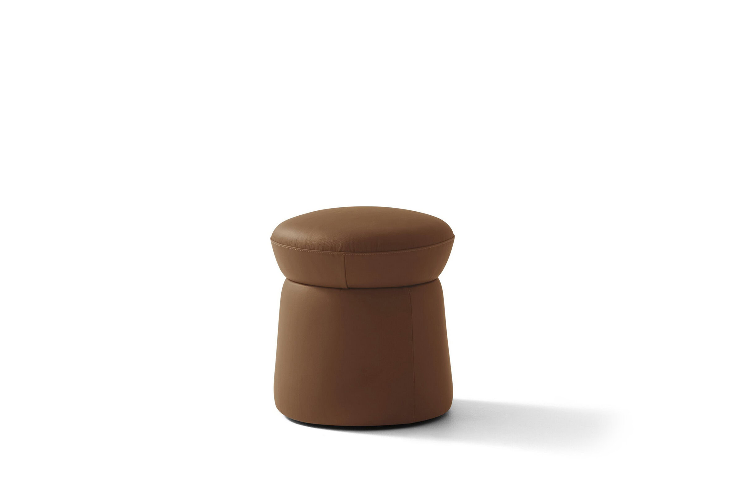 Brown leather ottoman with a modern, minimalist design for versatile living room or bedroom decor.