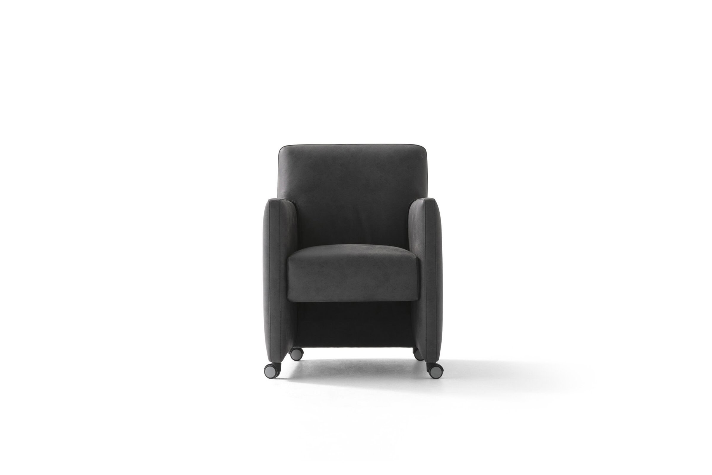 Sleek black leather armchair with modern design and casters for easy mobility, perfect for contemporary living spaces and office interiors.