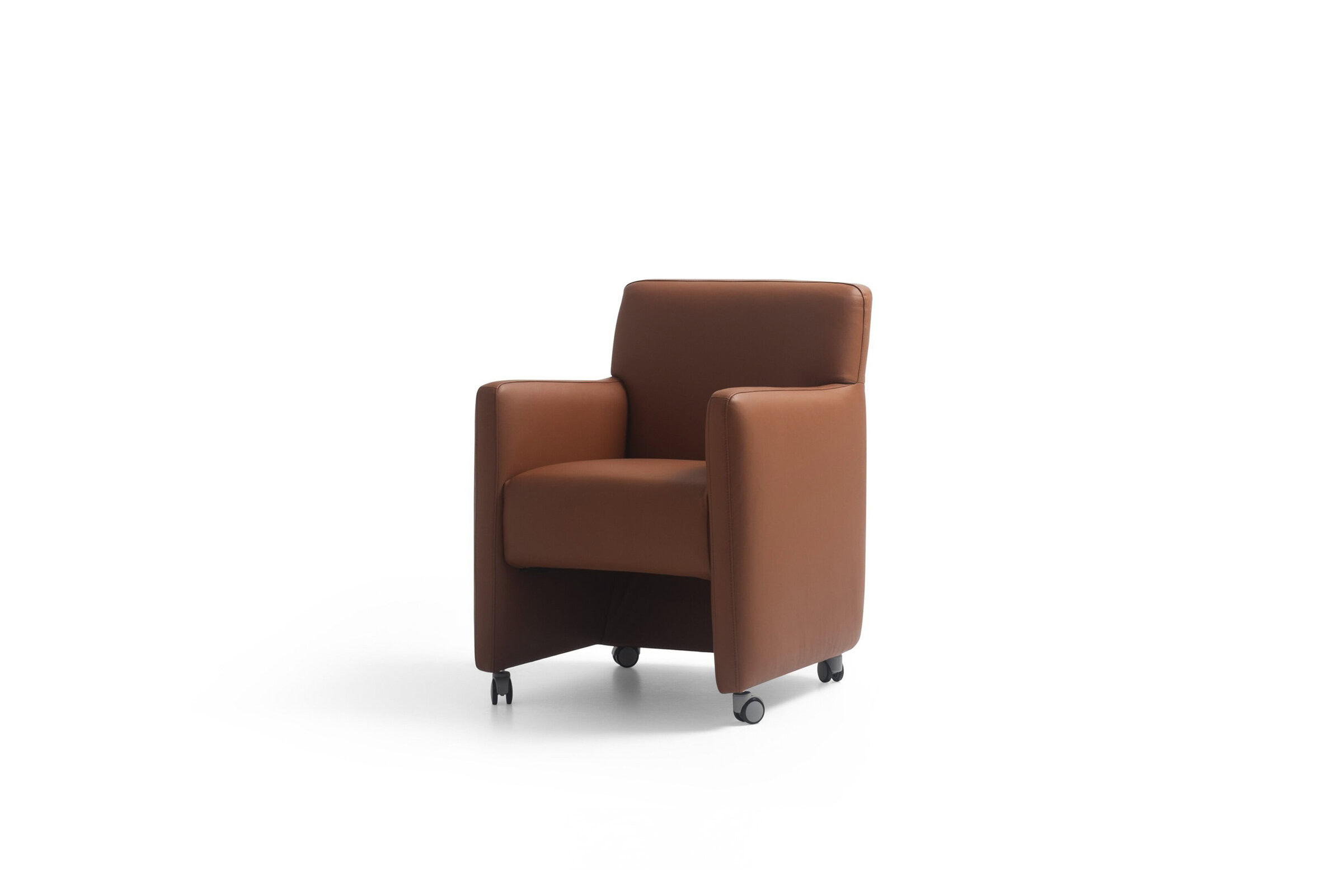 Luxurious caramel brown leather armchair with rolling caster wheels, modern design, perfect for contemporary living spaces and office decor.
