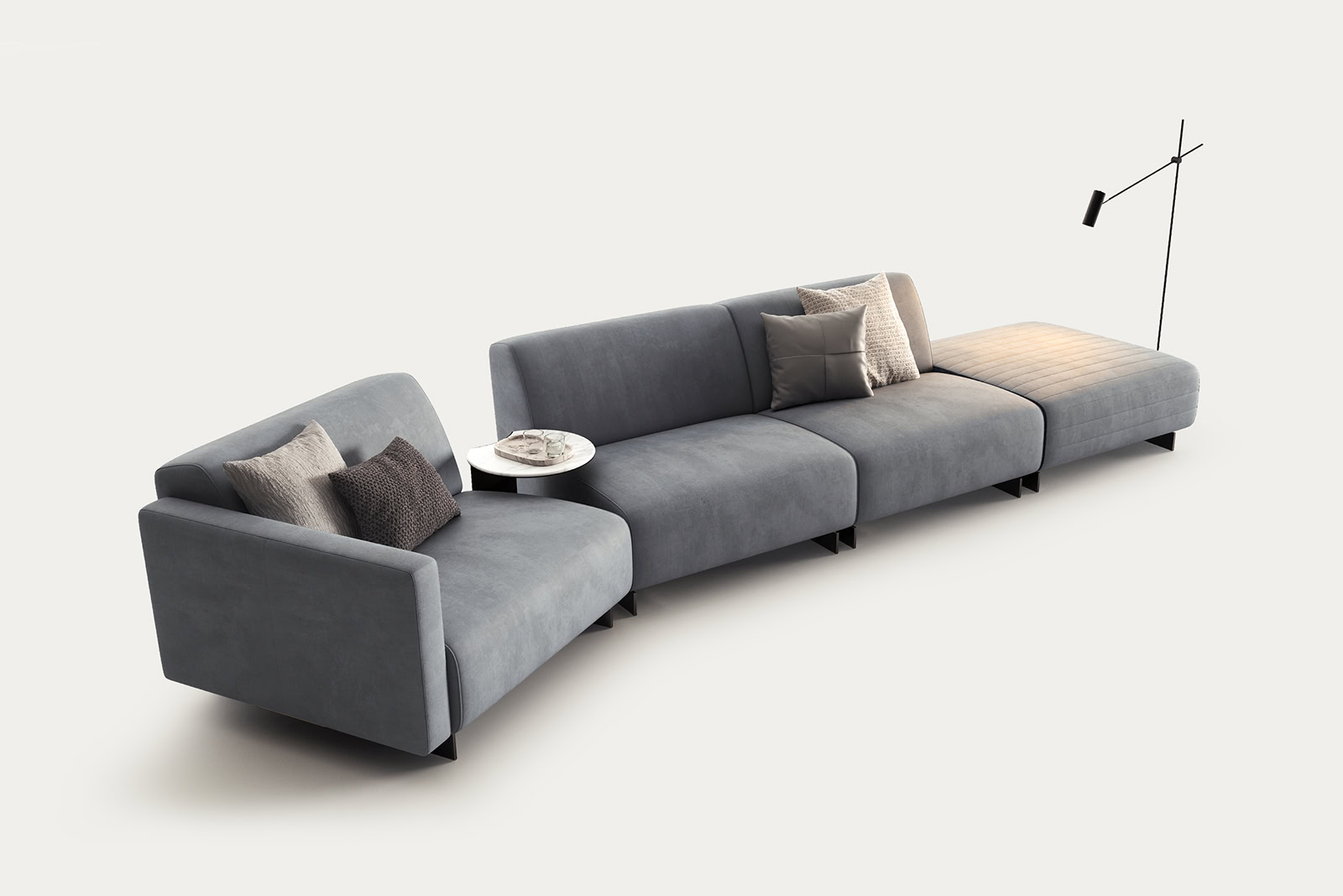 Contemporary grey sectional sofa with cushions and a side table, ideal for modern living rooms.