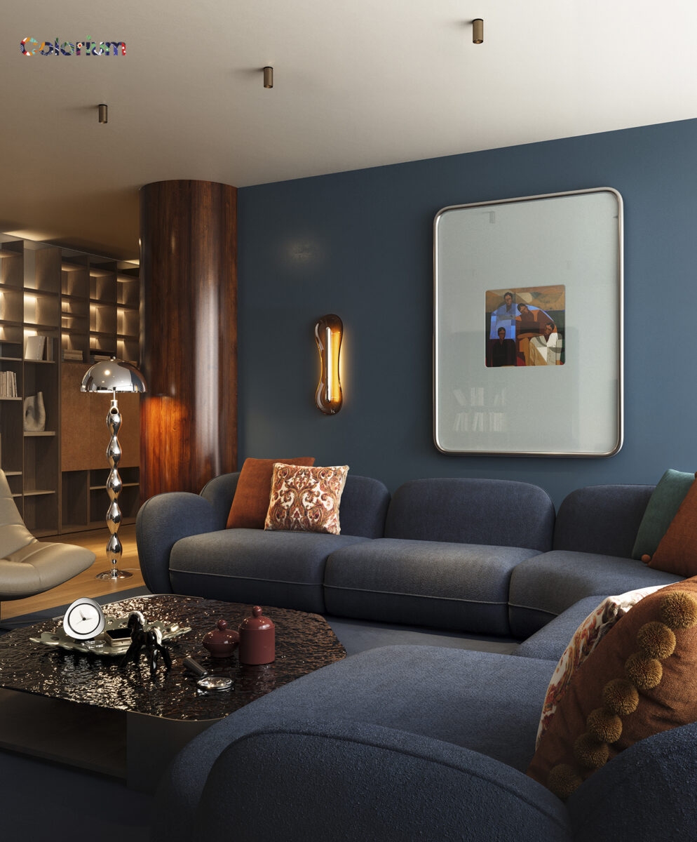 Stylish living room featuring a dark blue sofa, decorative pillows, a marble coffee table, and contemporary wall art, showcasing Saloni Furniture's elegant design.