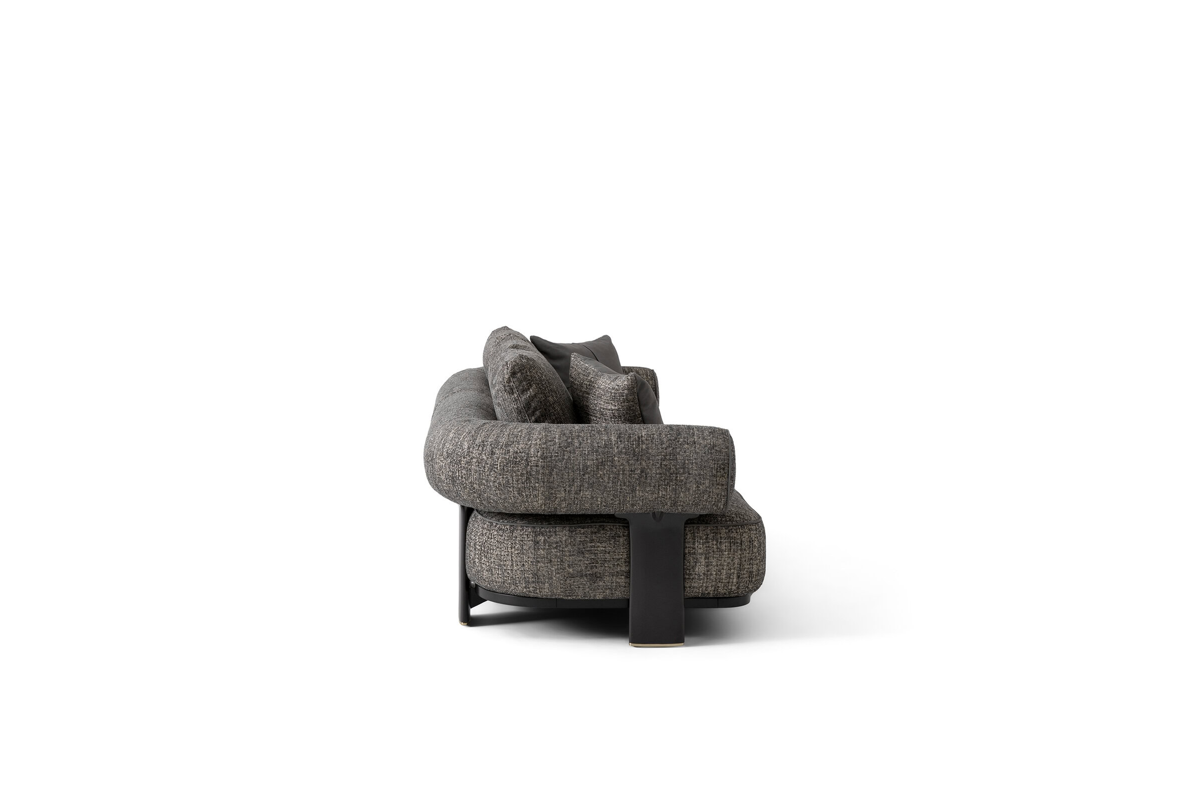 Luxurious contemporary fabric sofa showcasing plush cushions, stylish black accents, and a comfortable seating area ideal for upscale interior decor.