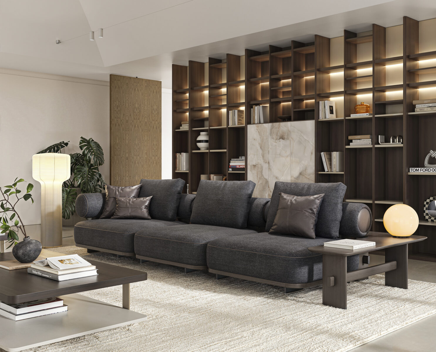 Luxurious dark grey sectional sofa with cushions in contemporary living room setting.