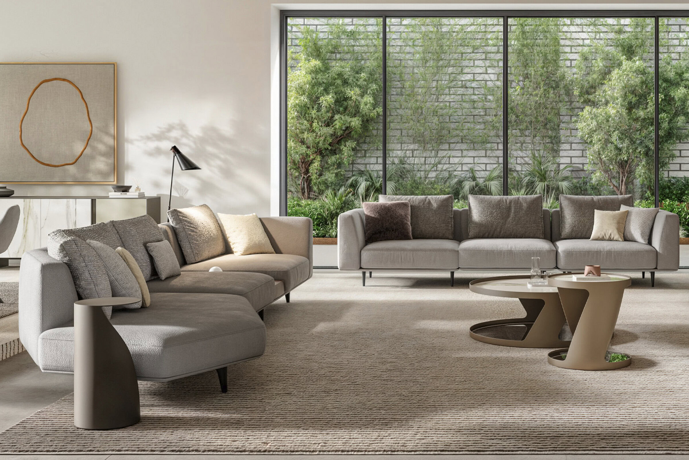 Luxurious modern living room with stylish neutral-colored sofas, contemporary coffee tables, and large glass windows overlooking lush greenery, showcasing high-end furniture from Saloni Furniture.