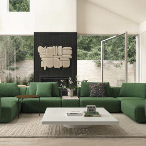 Contemporary green sofa set in a spacious, well-lit living room with large windows, modern decor, and a minimalist design perfect for stylish home interiors.