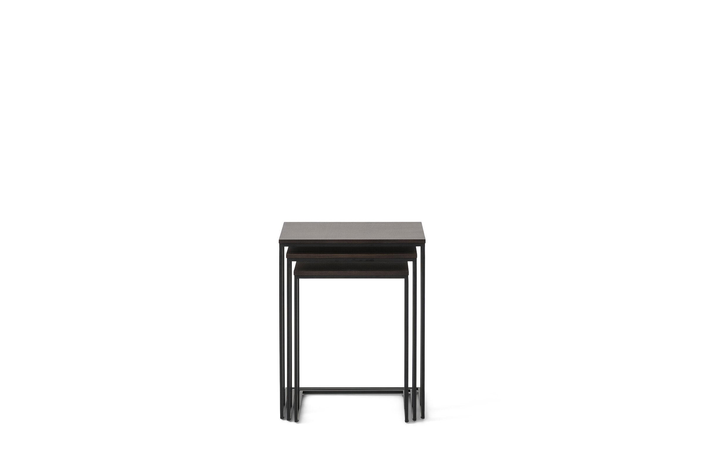 Set of three modern nesting tables with black metal frames and wooden tops, ideal for contemporary living spaces.
