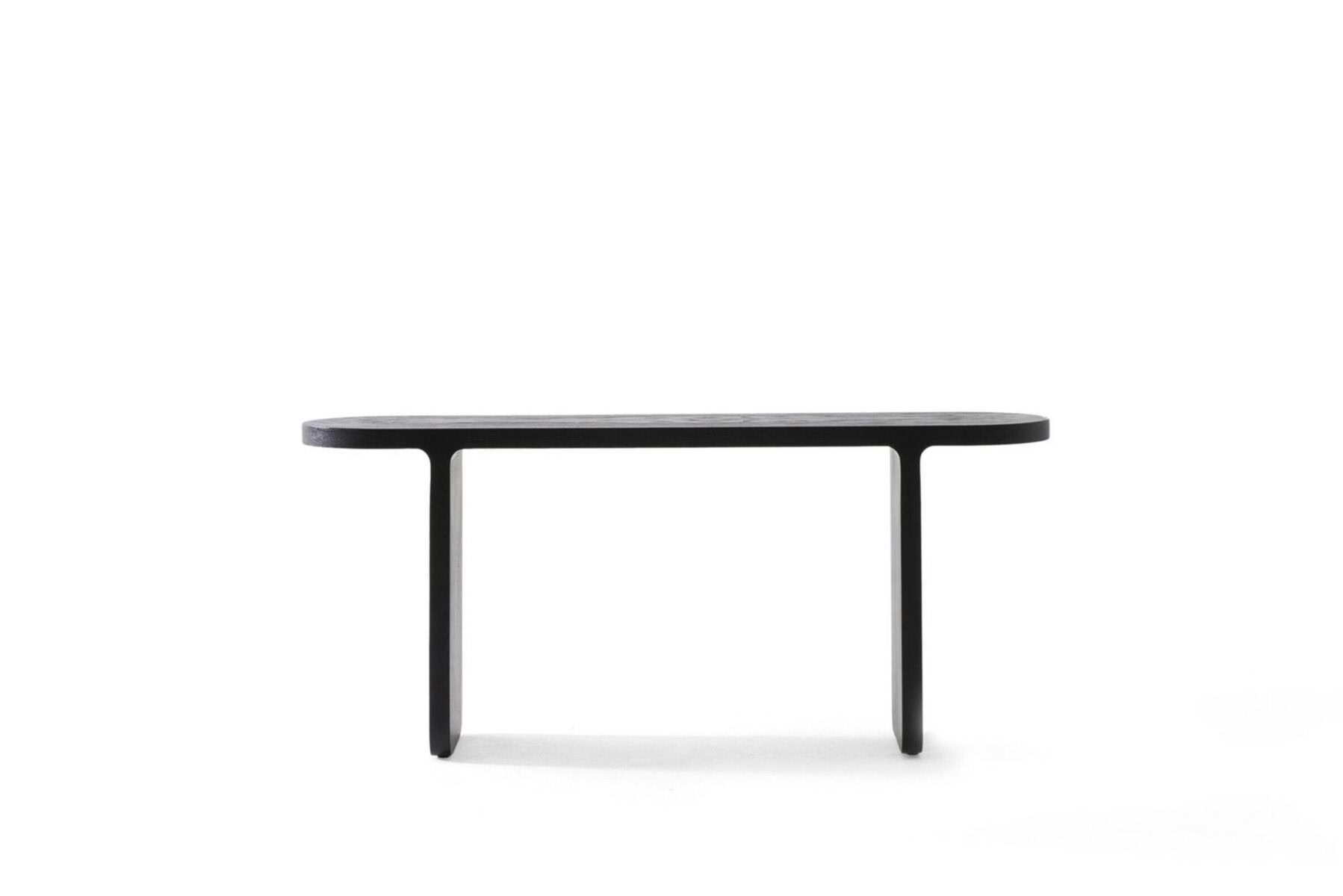 Minimalist black wooden dining table with sleek, modern design, perfect for contemporary homes and office spaces, showcasing high-quality craftsmanship and stylish craftsmanship.