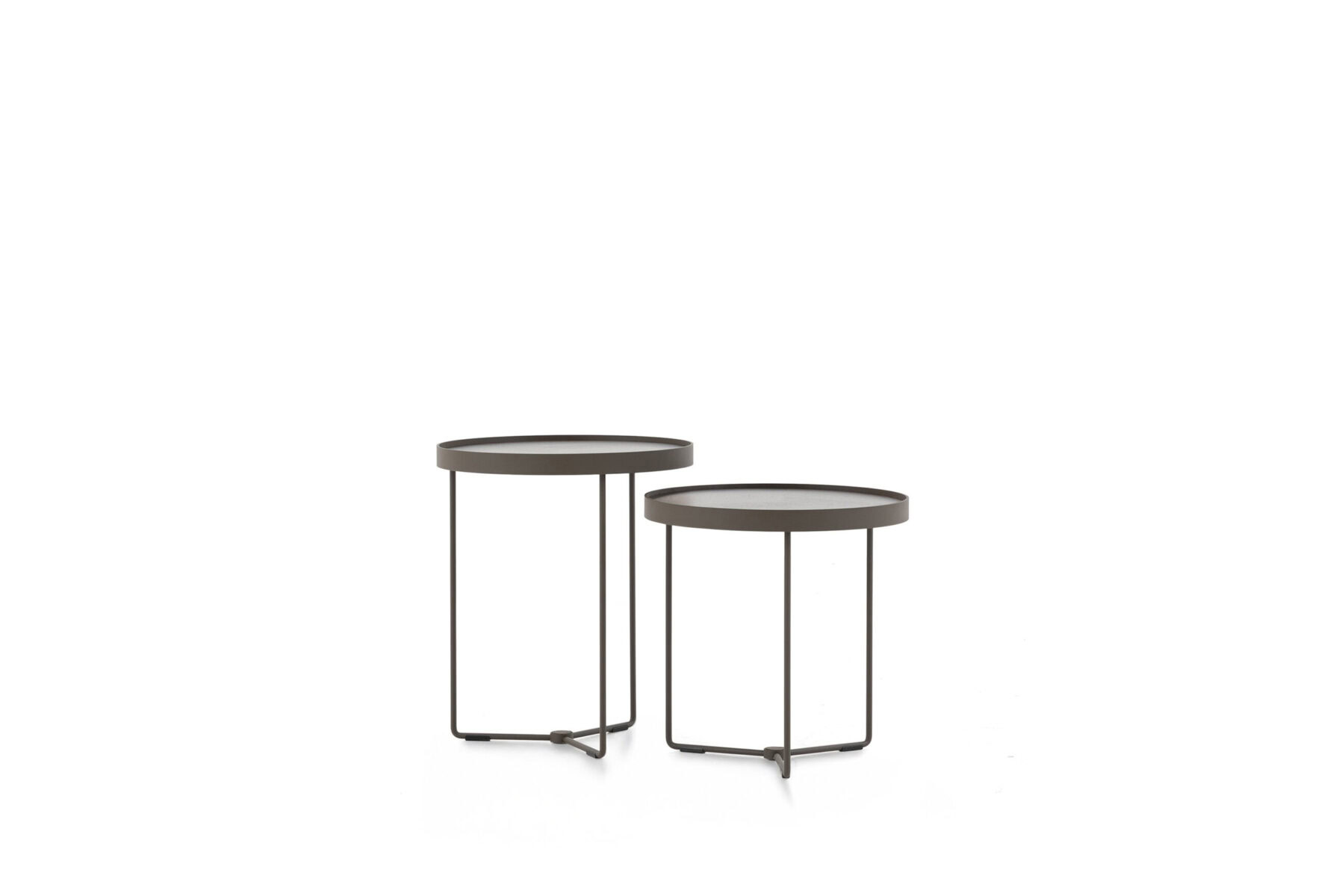 Modern minimalist round side tables with metal frames, ideal for contemporary living rooms, bedrooms, or offices, available at Saloni Furniture.
