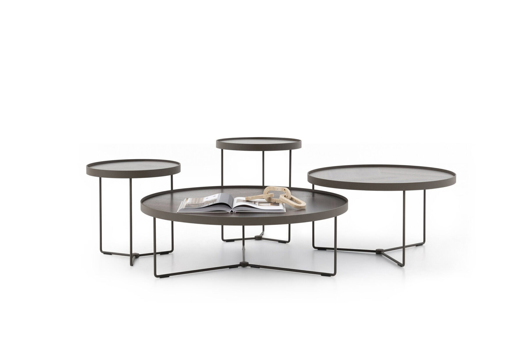 Contemporary multi-tier coffee tables with black metal frames and round surfaces, perfect for modern living rooms and stylish decor.
