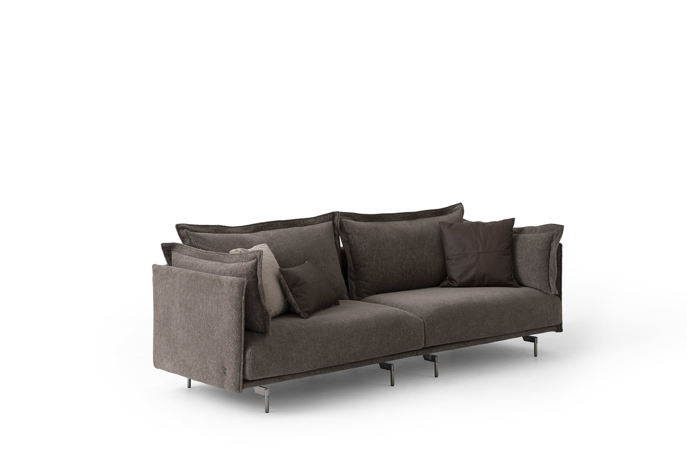 Elegant grey sofa with plush cushions, perfect for contemporary living rooms, offering comfort and stylish design. Ideal for home decor and furniture upgrades.