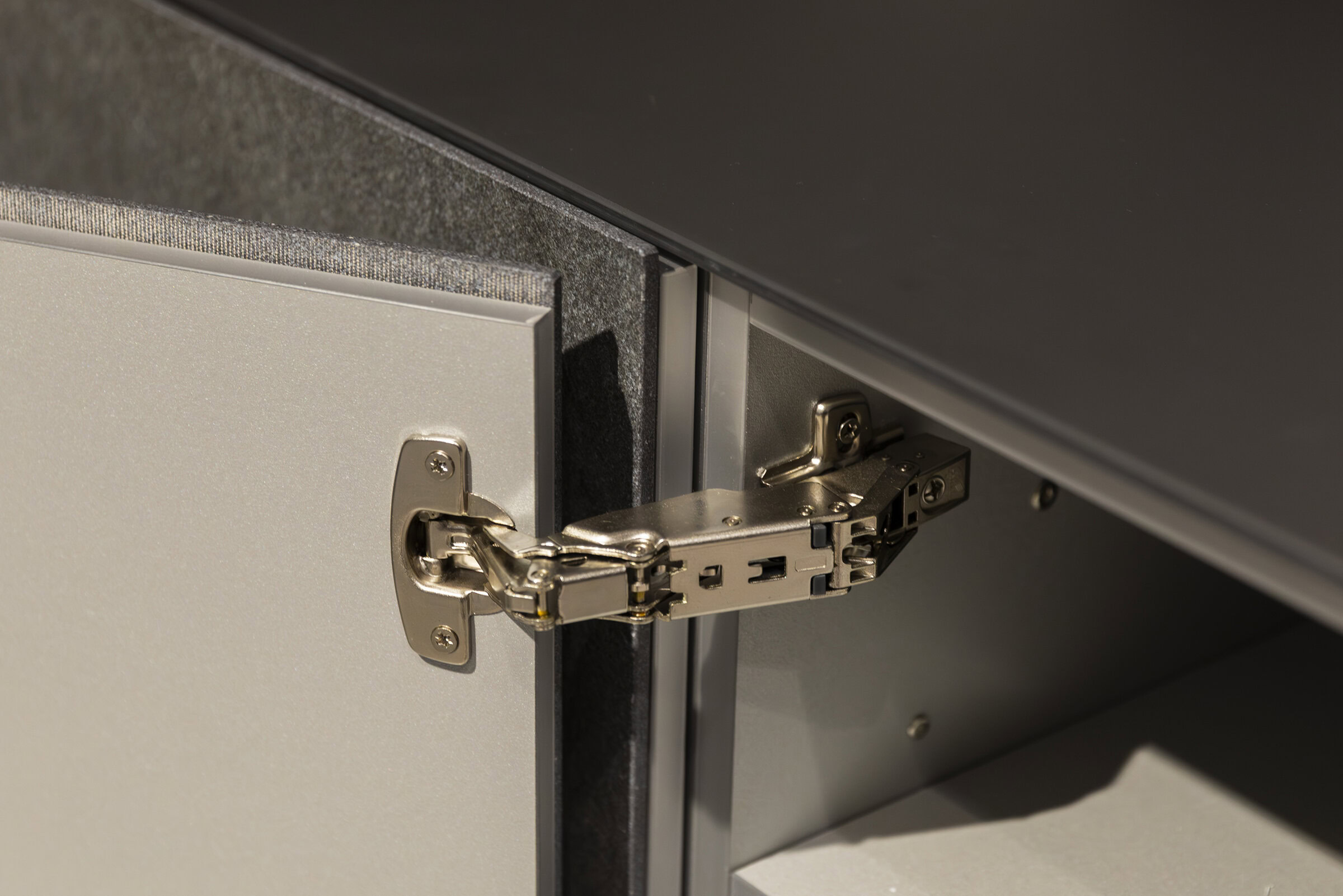 High-quality kitchen cabinet hinge for durable furniture assembly, showcasing precision-engineered metal components for smooth operation and stability.