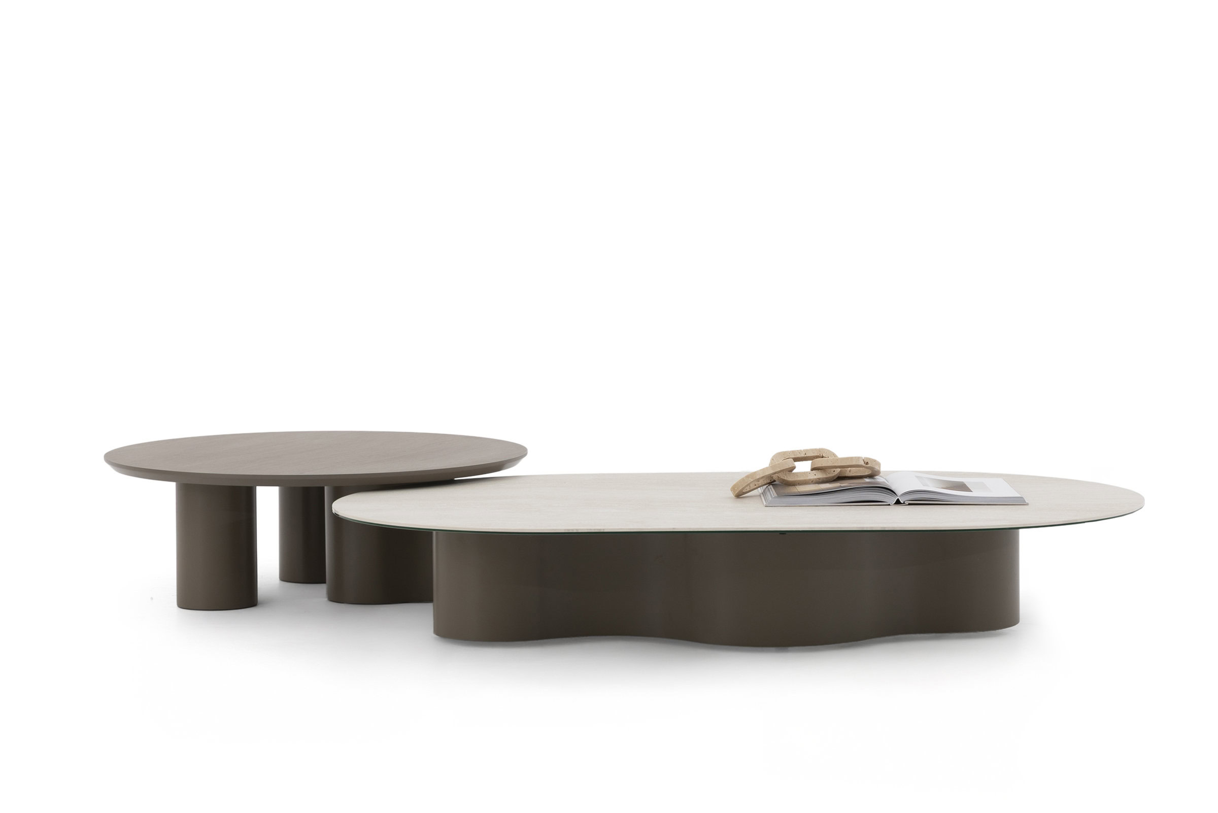 Minimalist modern coffee tables with organic shapes in neutral tones, perfect for contemporary living room decor, offering aesthetic appeal and functional convenience.
