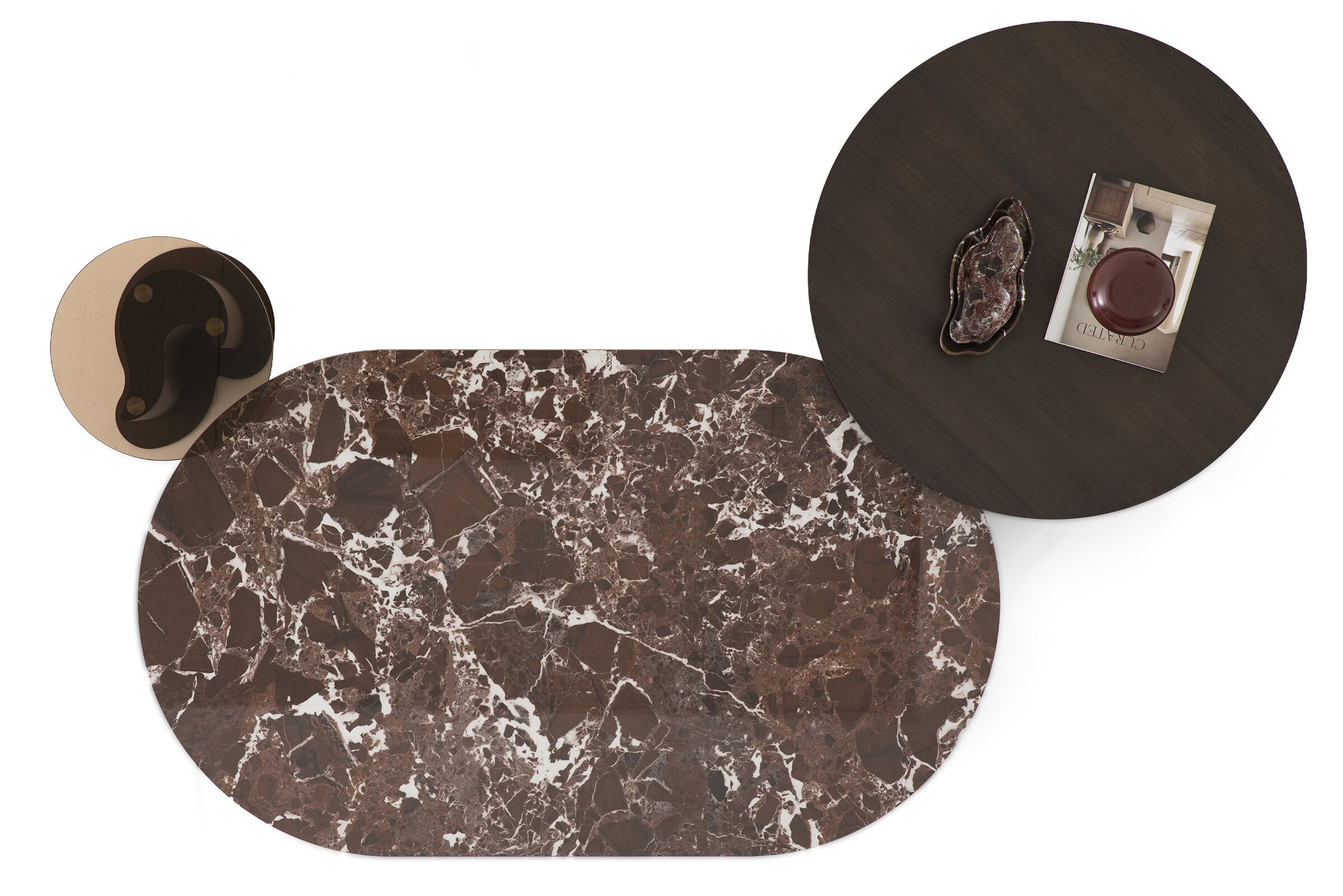 Stylish marble coffee table with dark wood side table and decorative accessories, perfect for modern living room decor.
