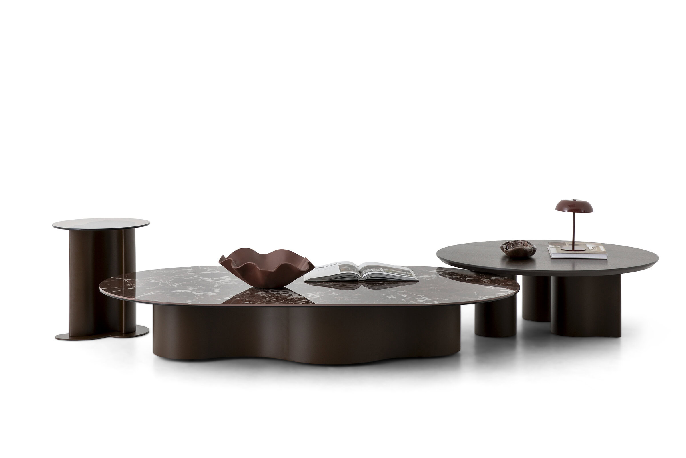 Set of stylish modern coffee tables with marble tops and dark bases, ideal for contemporary living rooms.