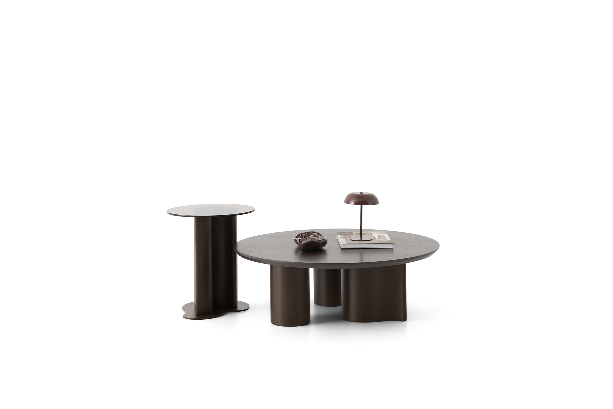 Set of modern coffee and side tables with dark wood finish, minimalist design, and unique cylindrical bases, ideal for contemporary living rooms.
