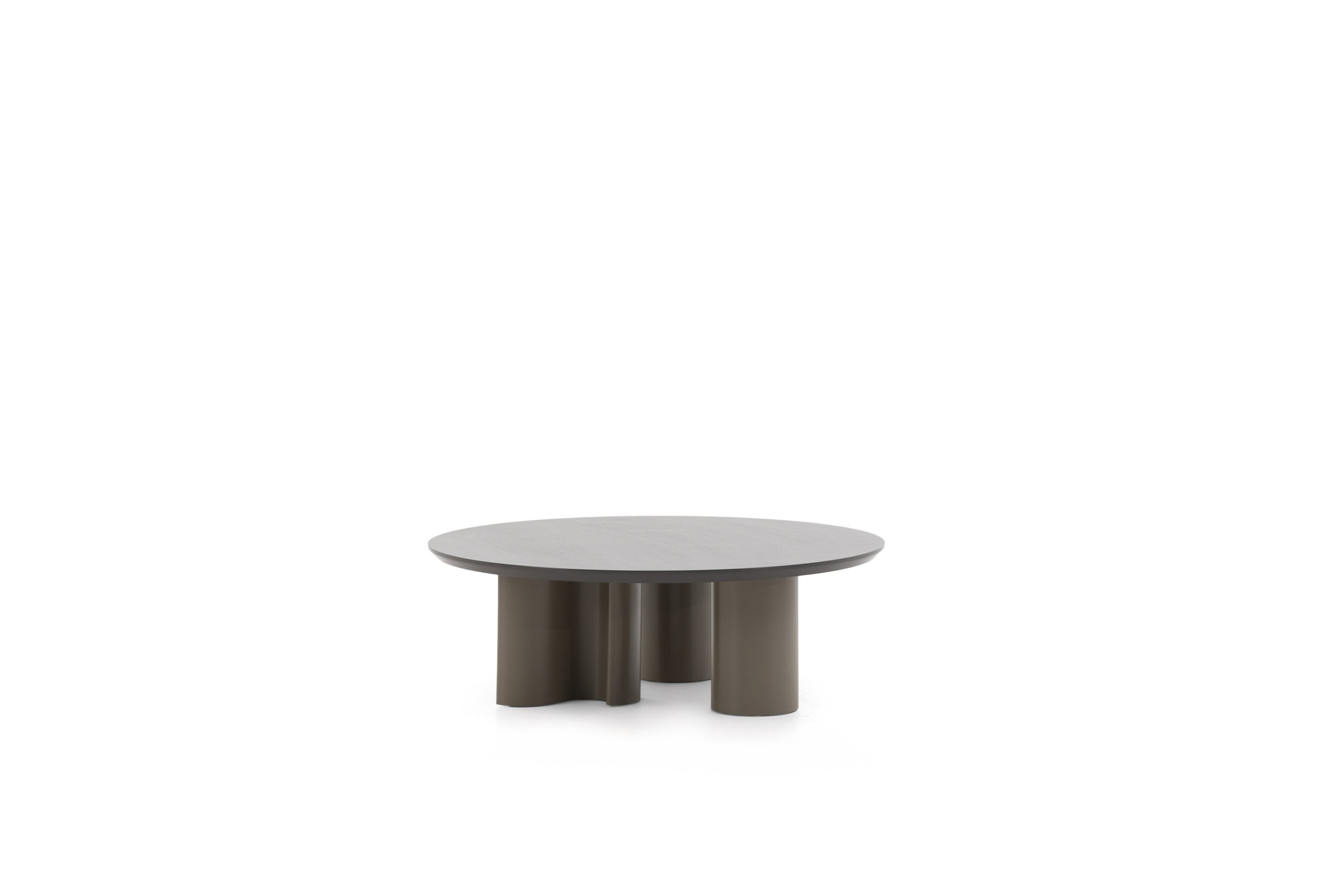 Sleek modern coffee table with round top and unique sculptural legs in taupe finish, perfect for contemporary living rooms.
