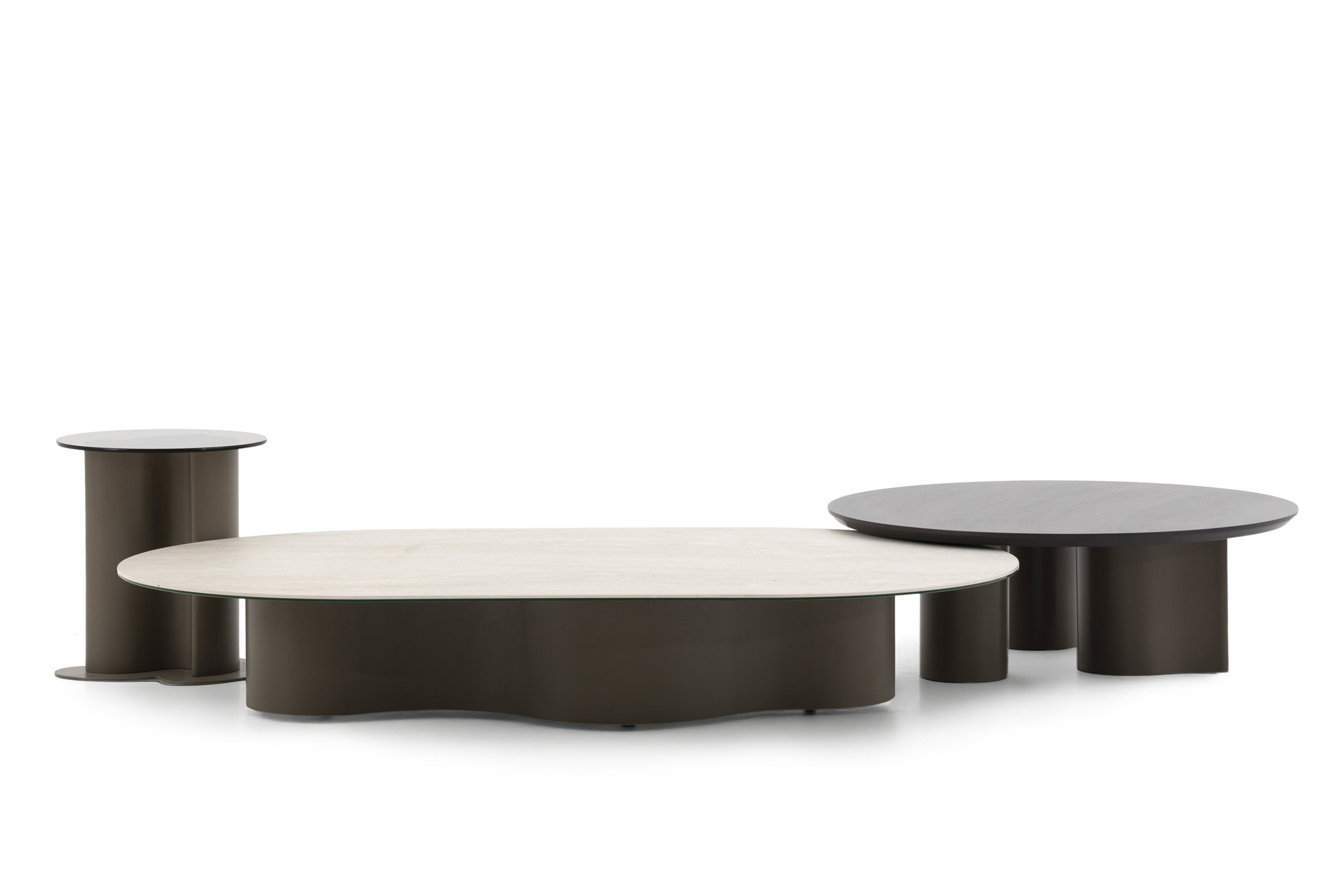 Contemporary modern coffee tables set featuring a combination of black and beige finishes, with rounded shapes and cylindrical bases, ideal for stylish living room decor.