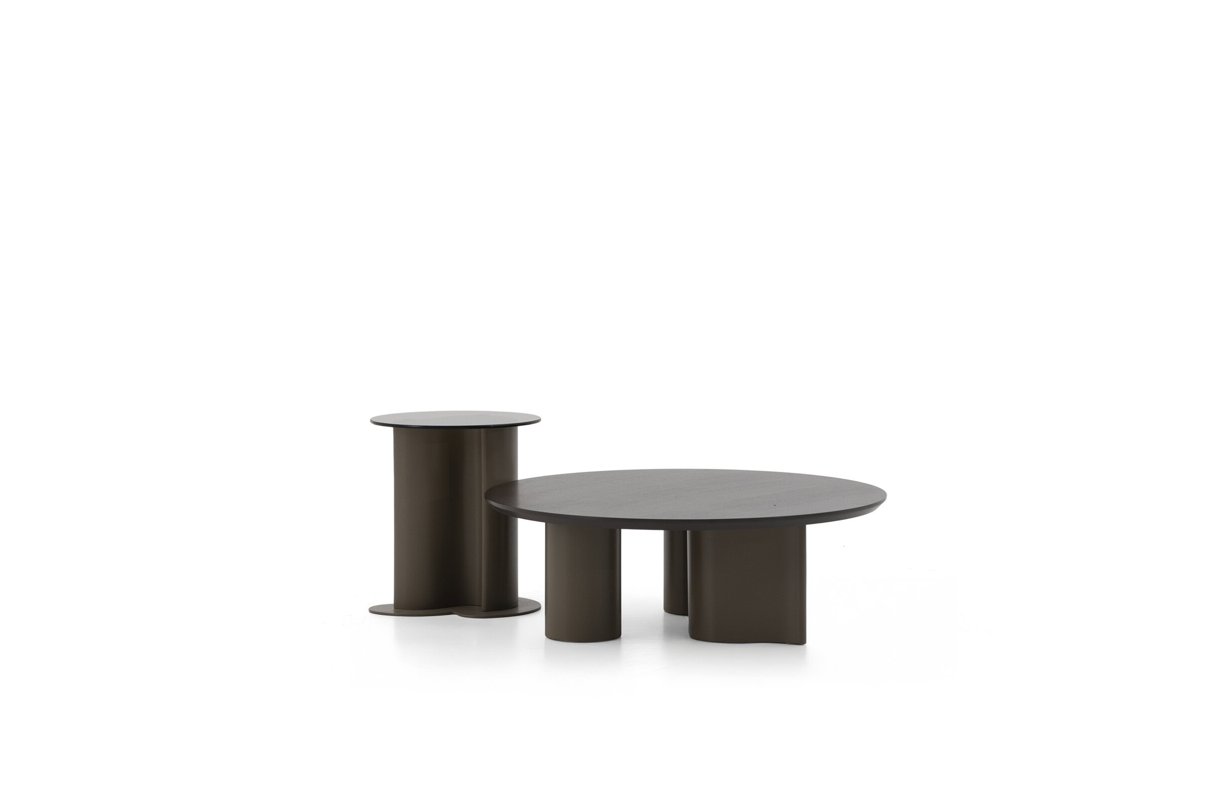 Sleek modern brown coffee tables set with oval and round tabletops, ideal for contemporary living spaces and stylish interior decor.