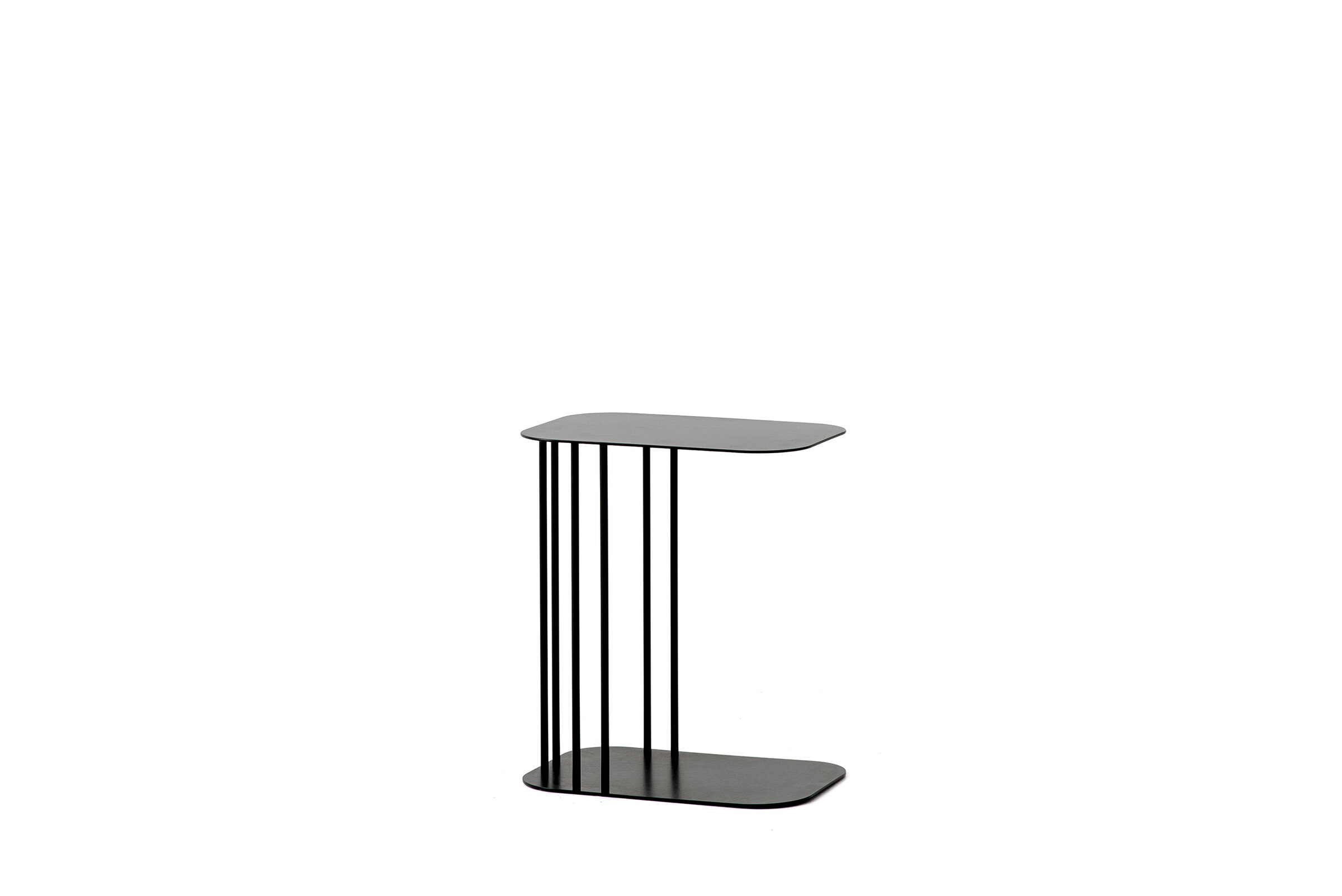 Contemporary black metal side table with a sleek design, perfect for modern living spaces, from Saloni Furniture.