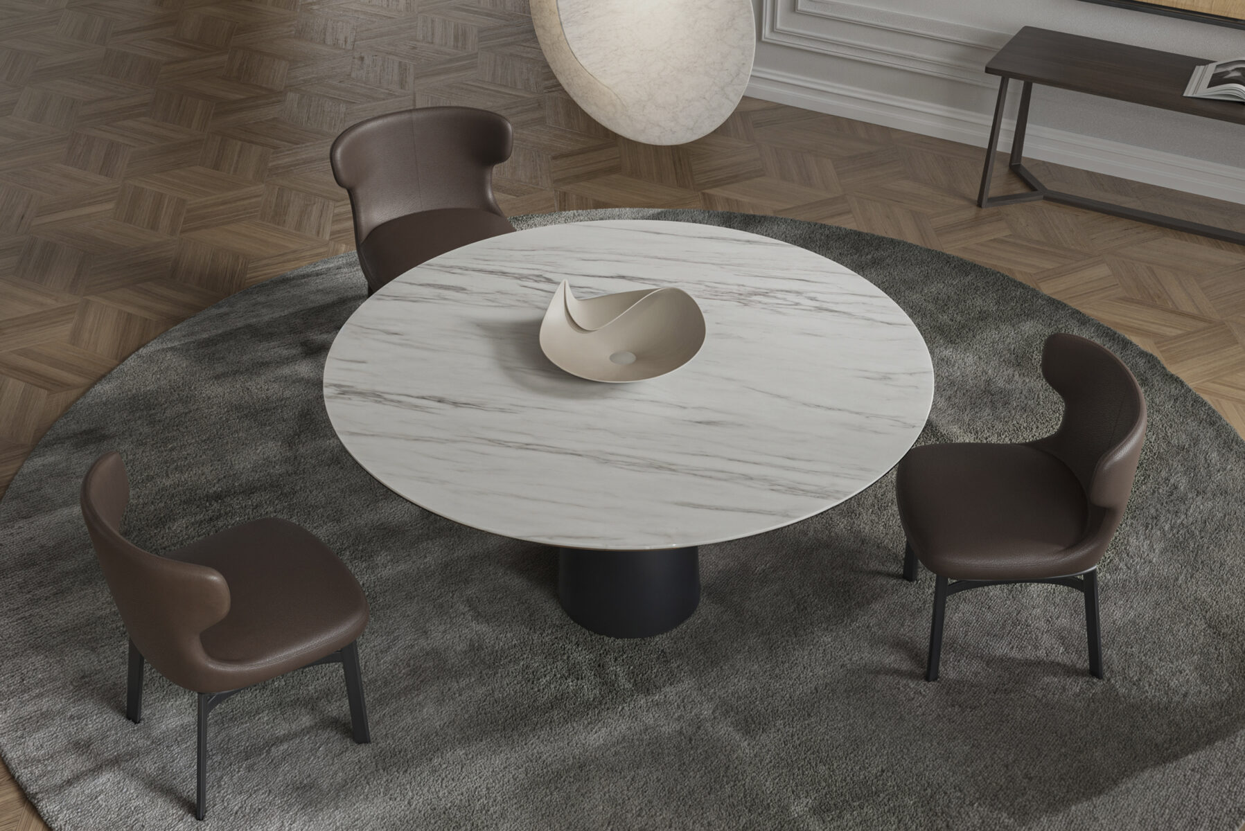 Elegant round dining table with a marble top surrounded by three brown chairs in a stylish interior setting.