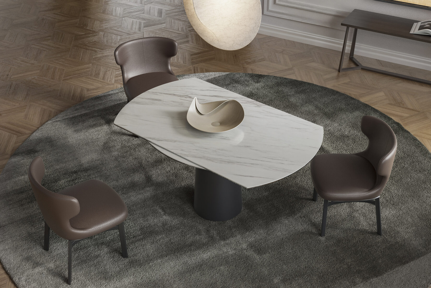 Contemporary dining table with a marble top and four brown leather chairs in a stylish interior setting.