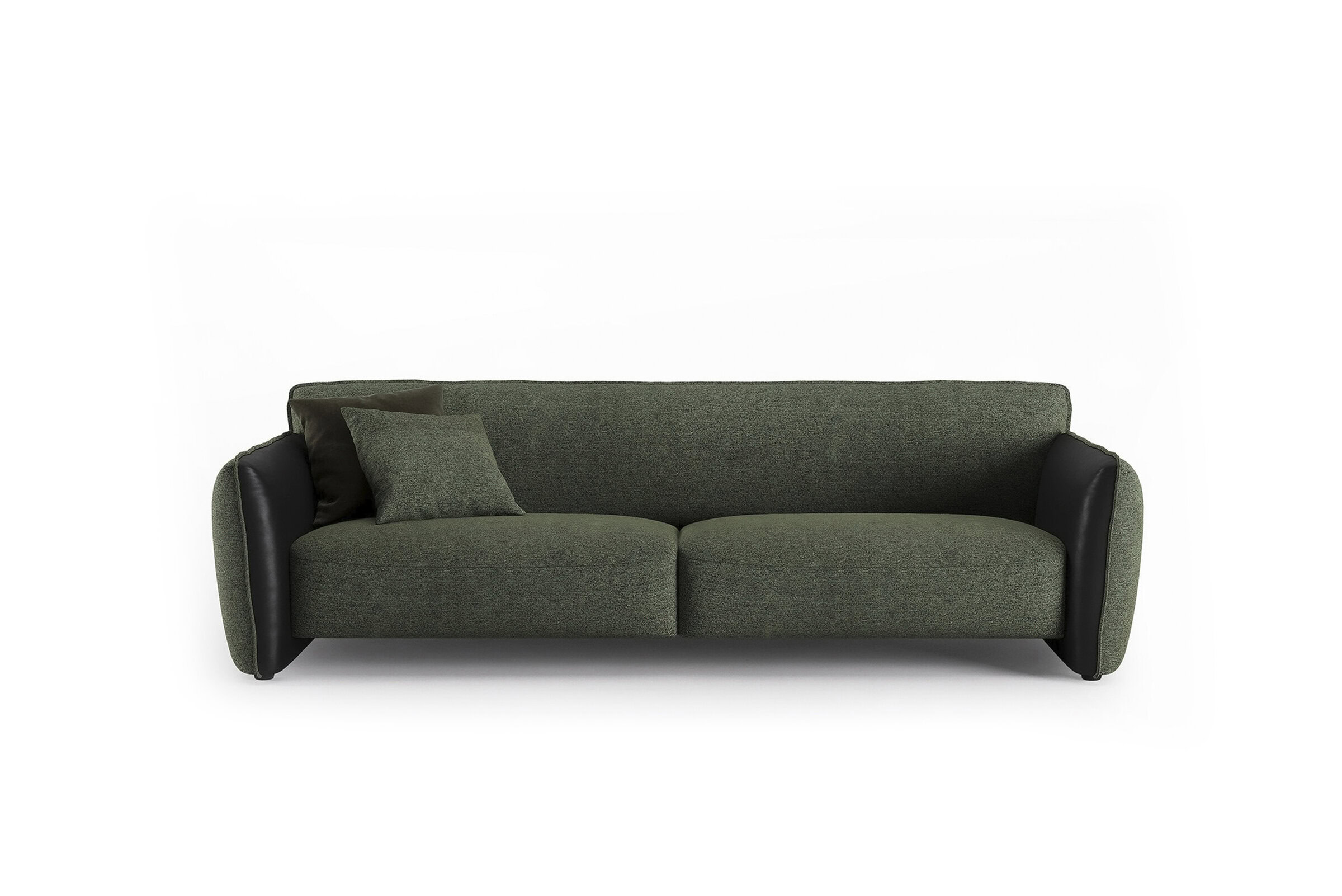 Contemporary green sofa with black leather accents, comfortable cushions, and modern design, ideal for stylish living room decor.