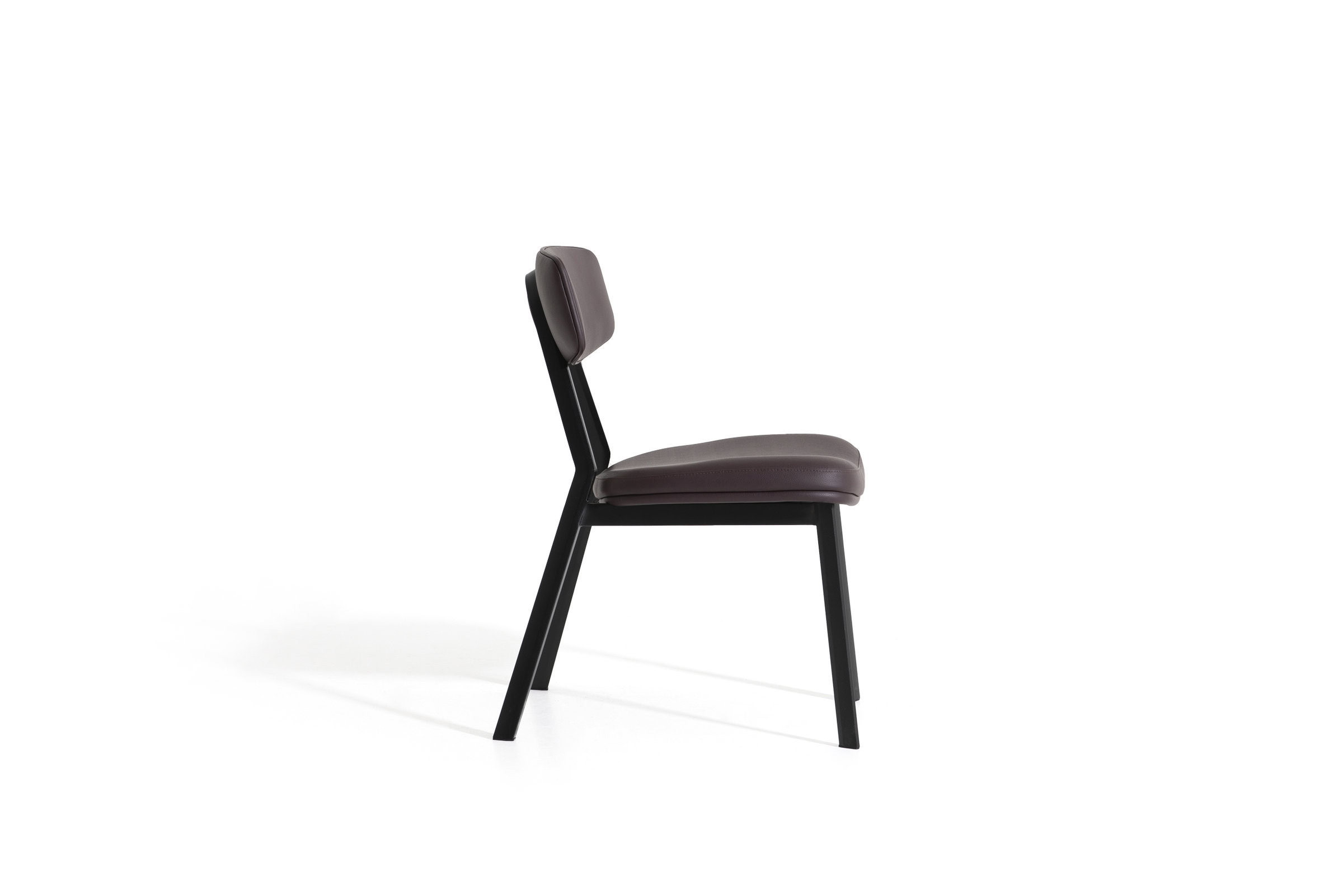 Elegant modern dining chair with black wooden frame and cushioned taupe leather upholstery for stylish home or office furniture.