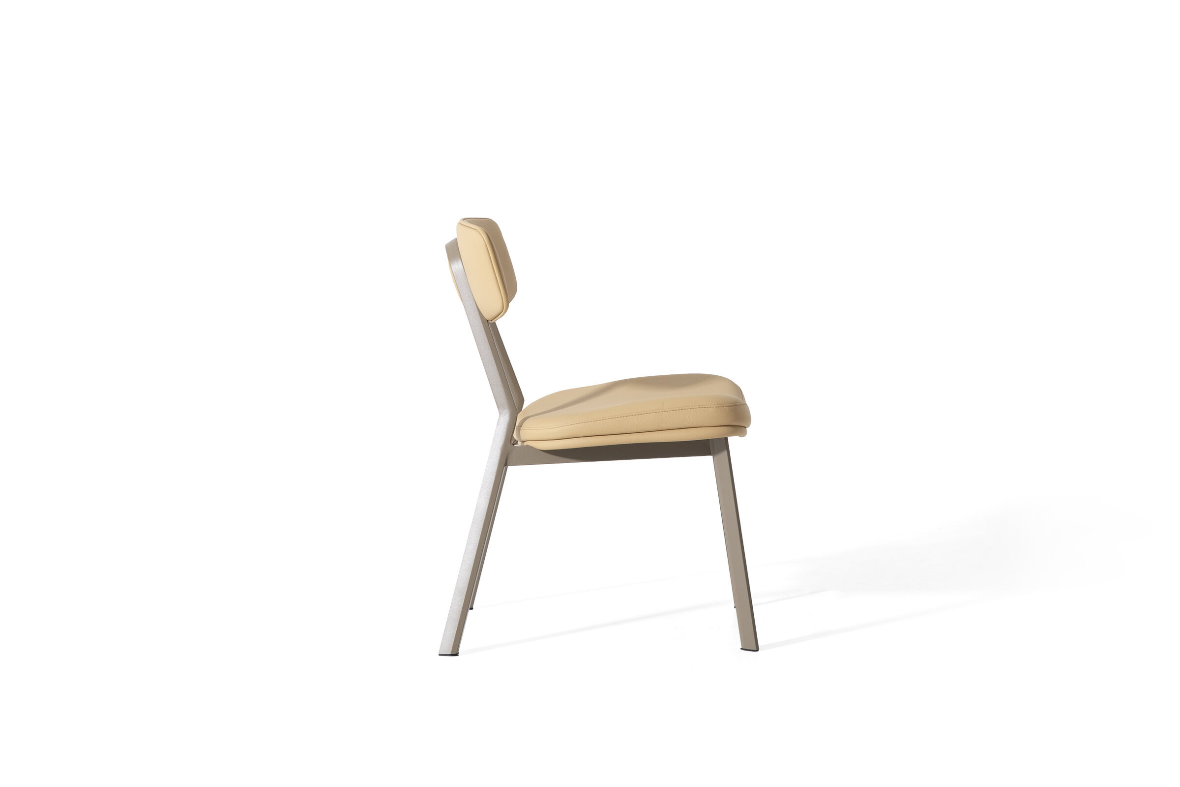 Comfortable modern beige upholstered dining chair with sleek metal frame, ideal for stylish home furniture and interior decor.